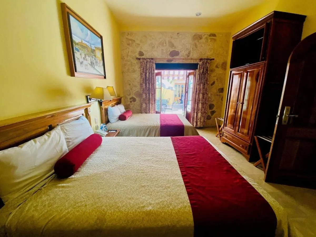 Bed in Cancun International Suites