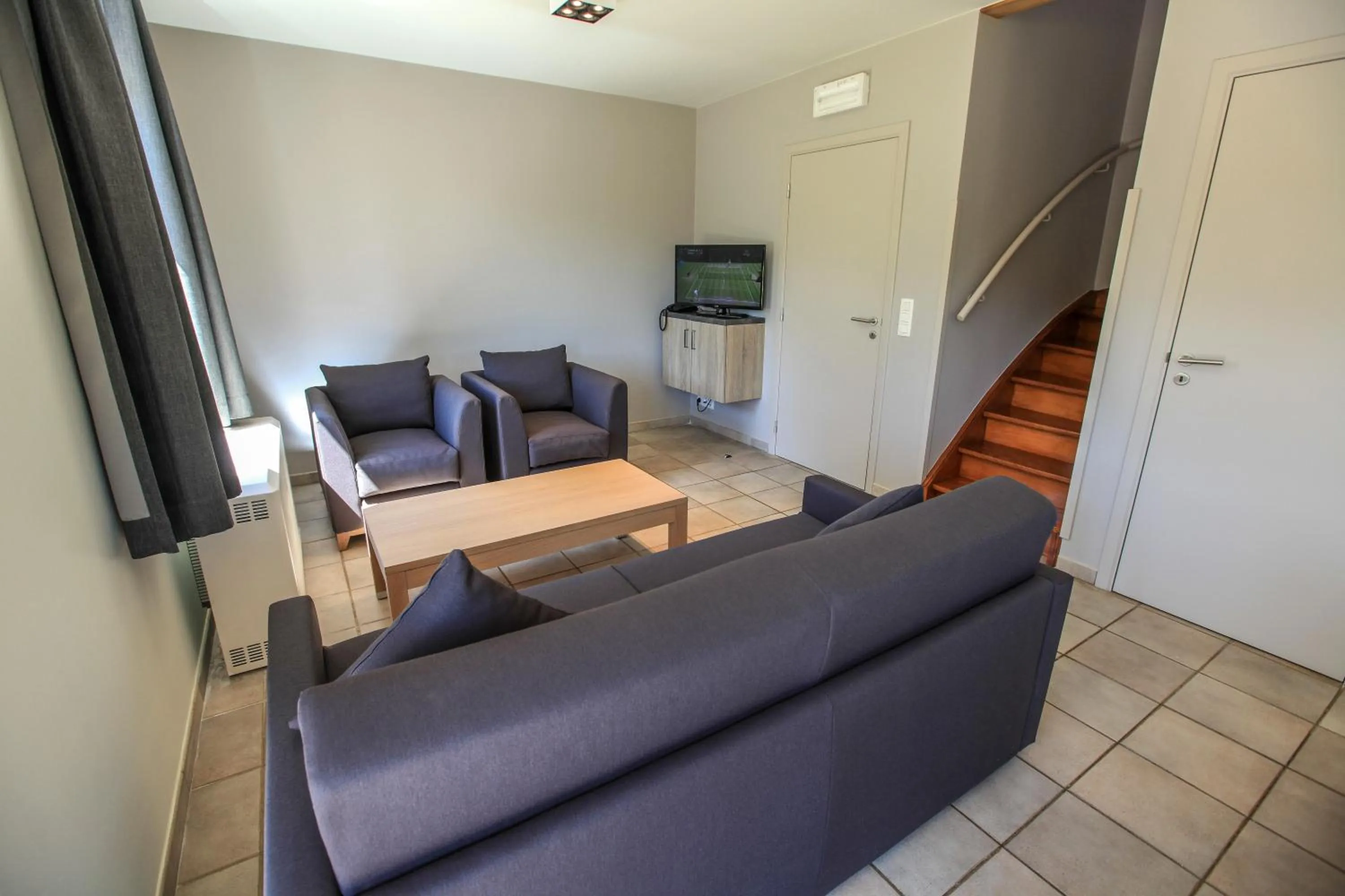 Living room in Maisons de Vacances Azur en Ardenne