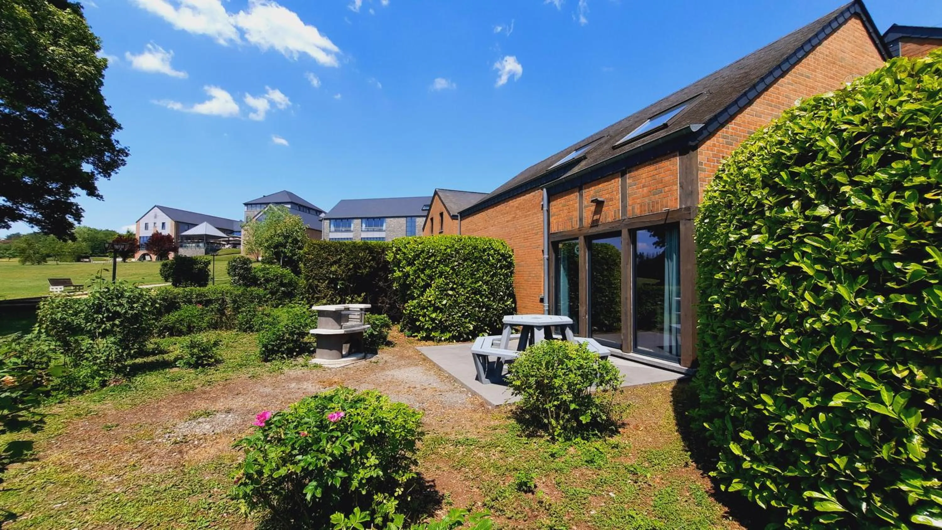 Garden view in Maisons de Vacances Azur en Ardenne