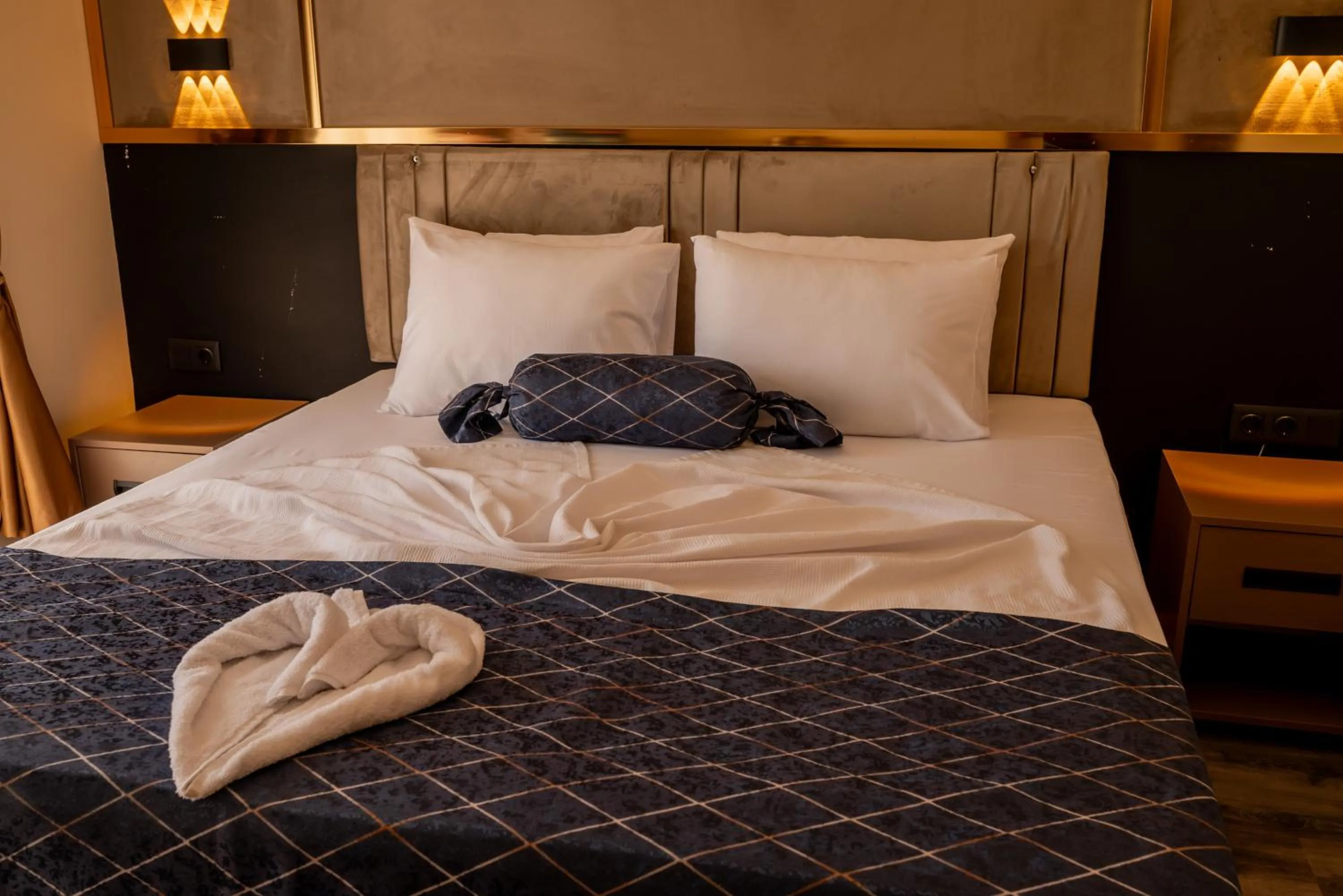 Bed in Arikan Inn Hotel