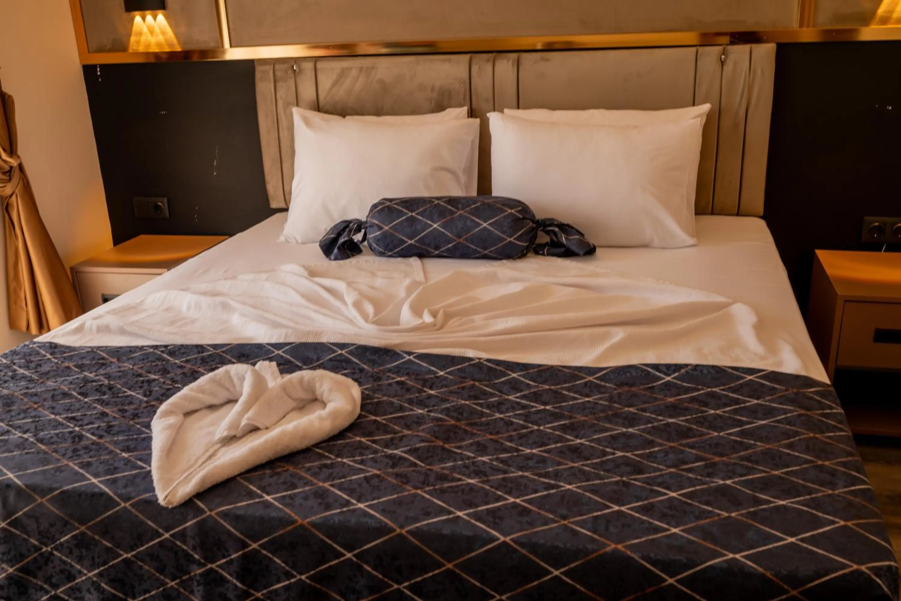 Bed in Arikan Inn Hotel