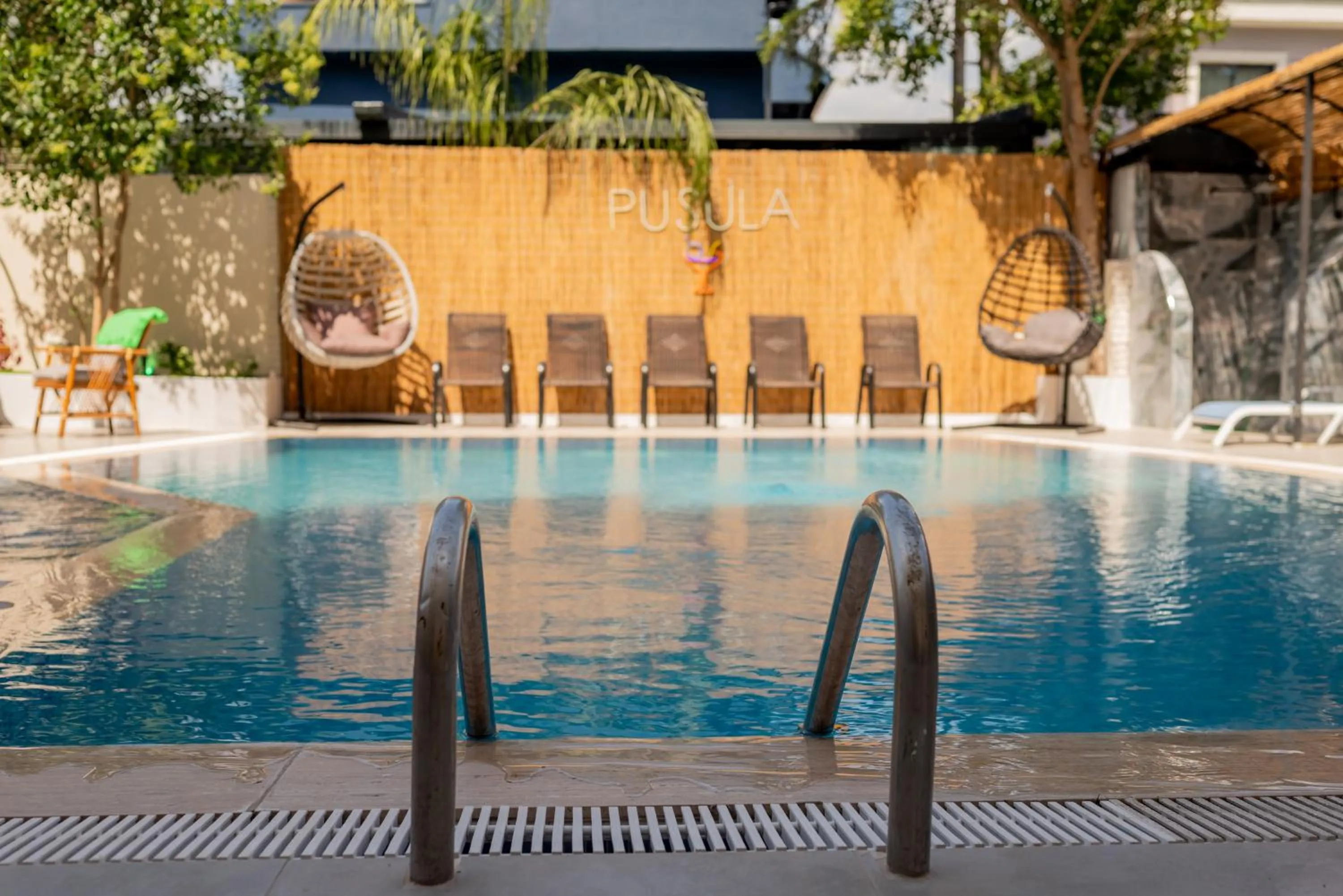 Patio, Swimming Pool in Arikan Inn Hotel