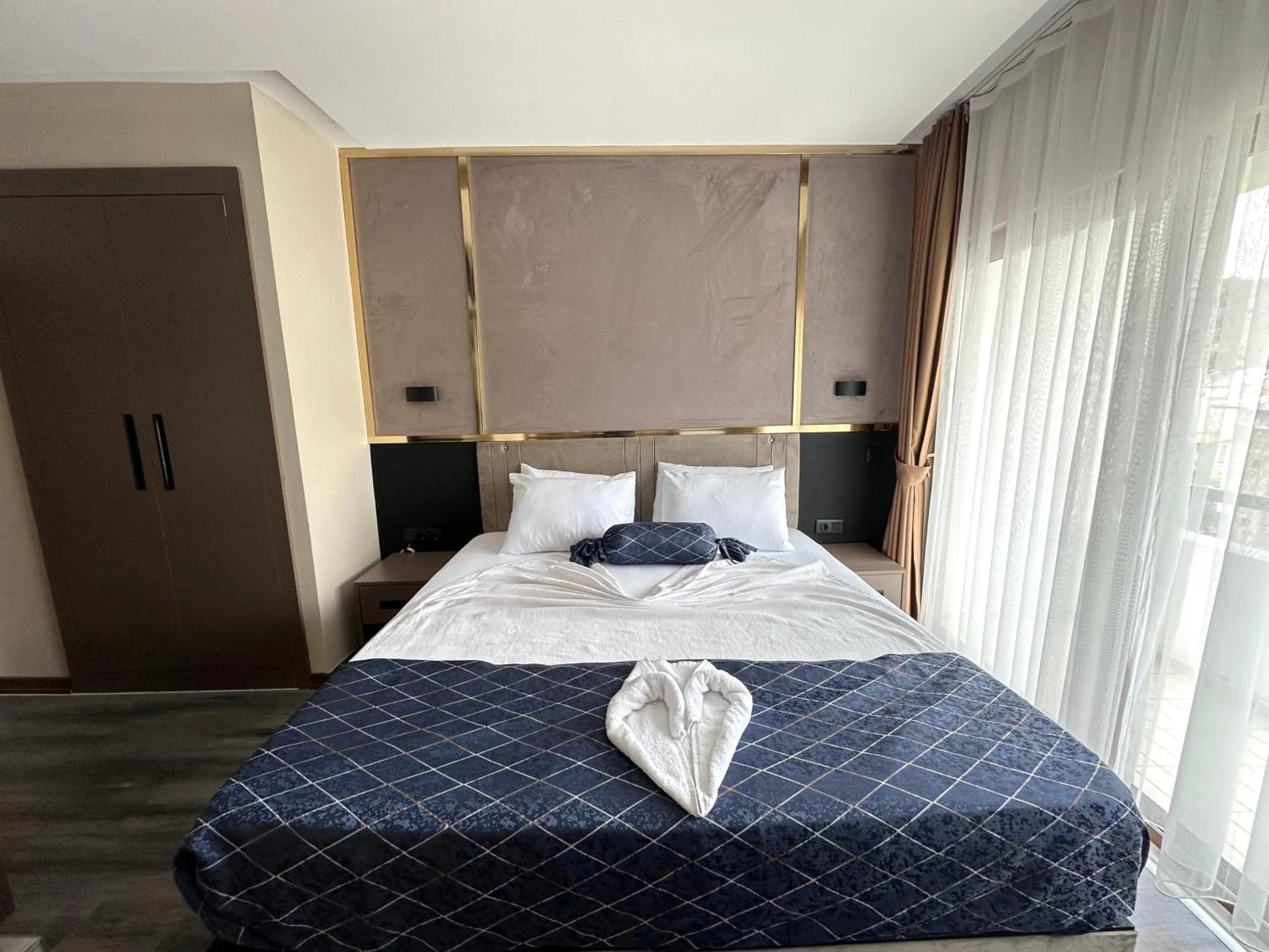 Bed in Arikan Inn Hotel