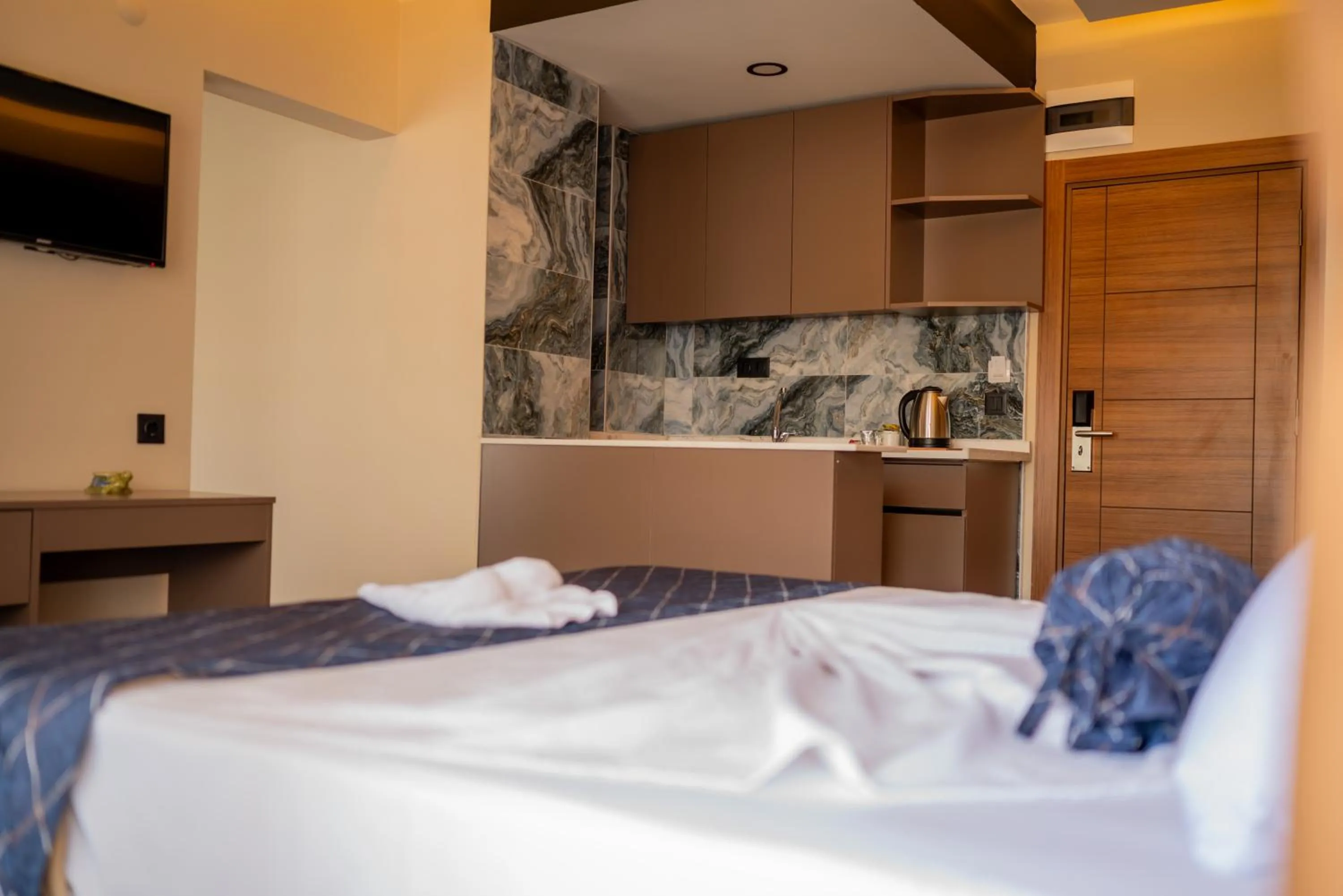 Bed in Arikan Inn Hotel