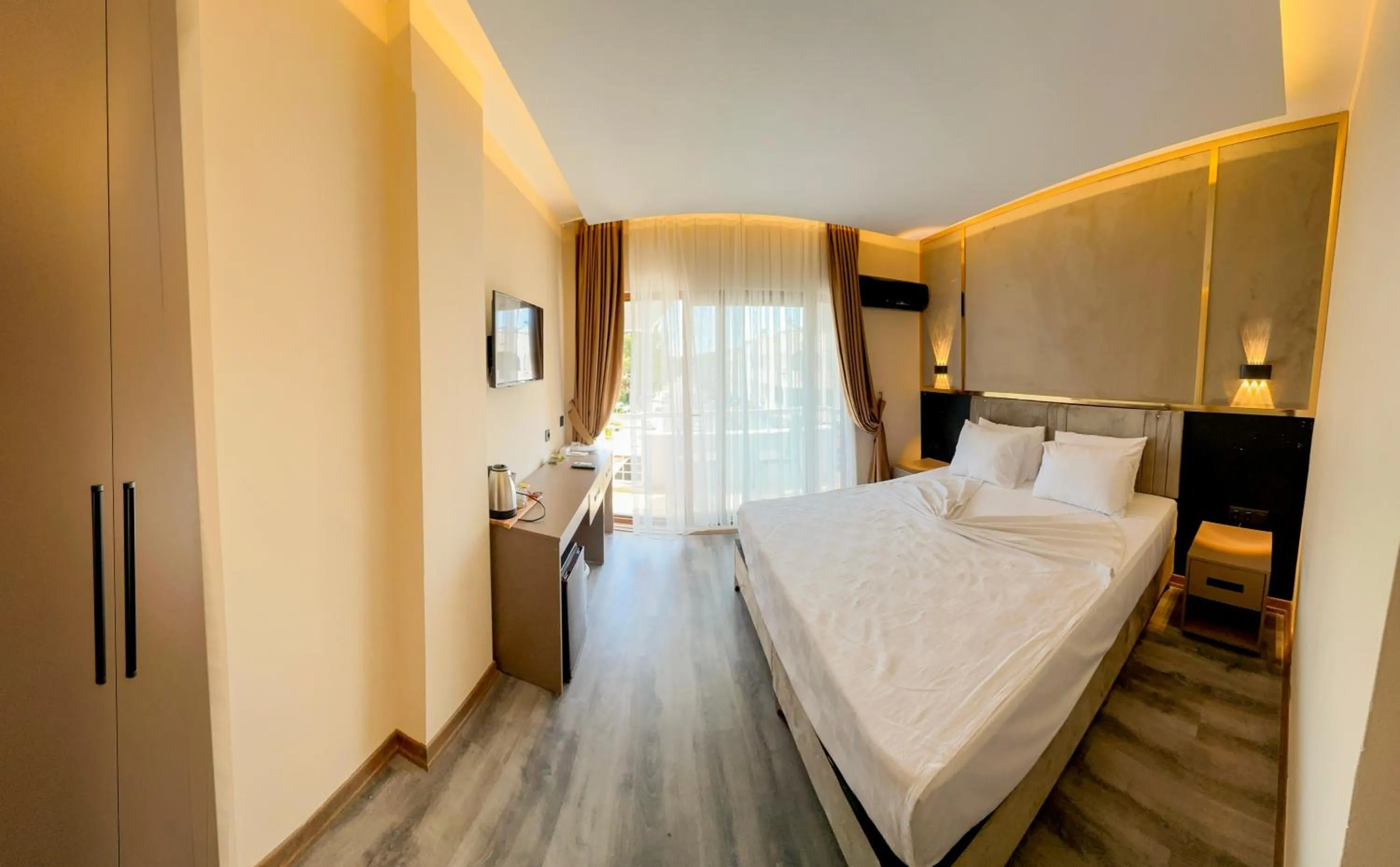 Bed in Arikan Inn Hotel