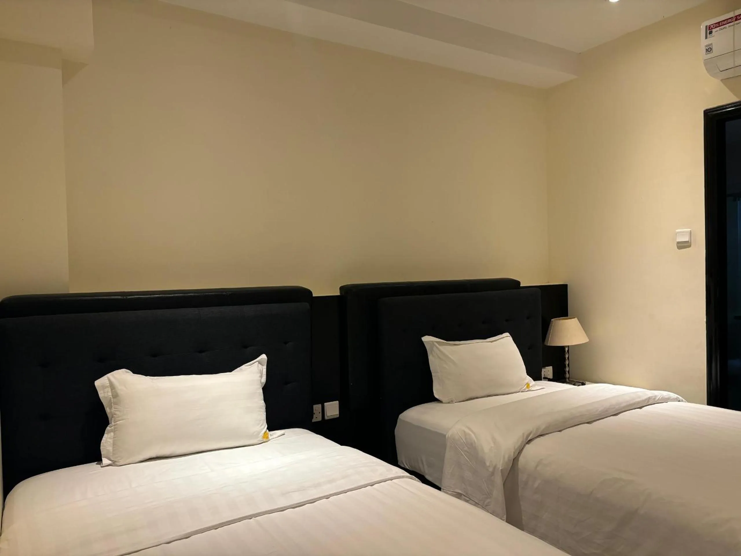 Bed in Palm Beach Hotel Dili