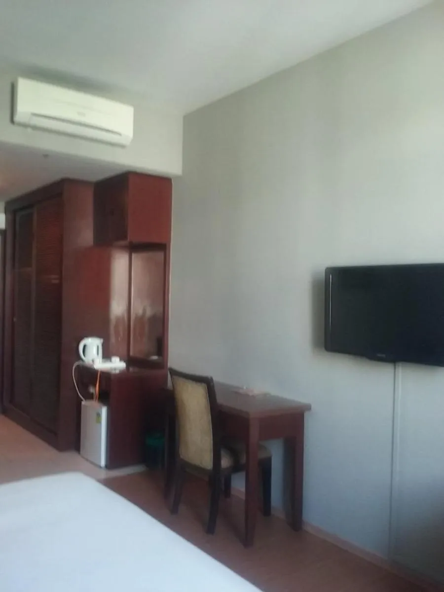 Bed in Ginasuite Hotel