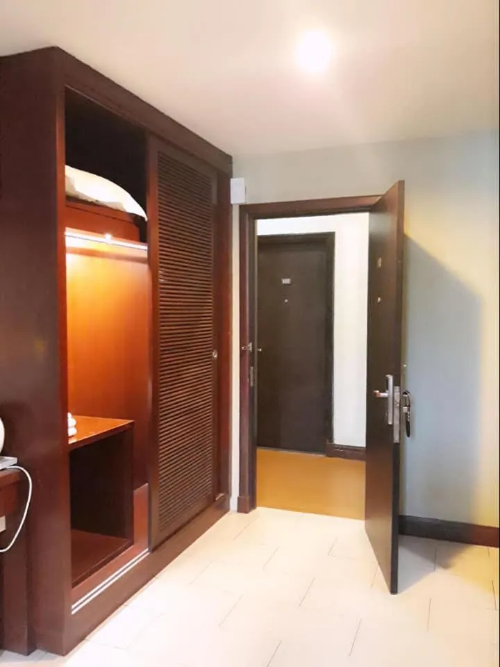 Bed in Ginasuite Hotel