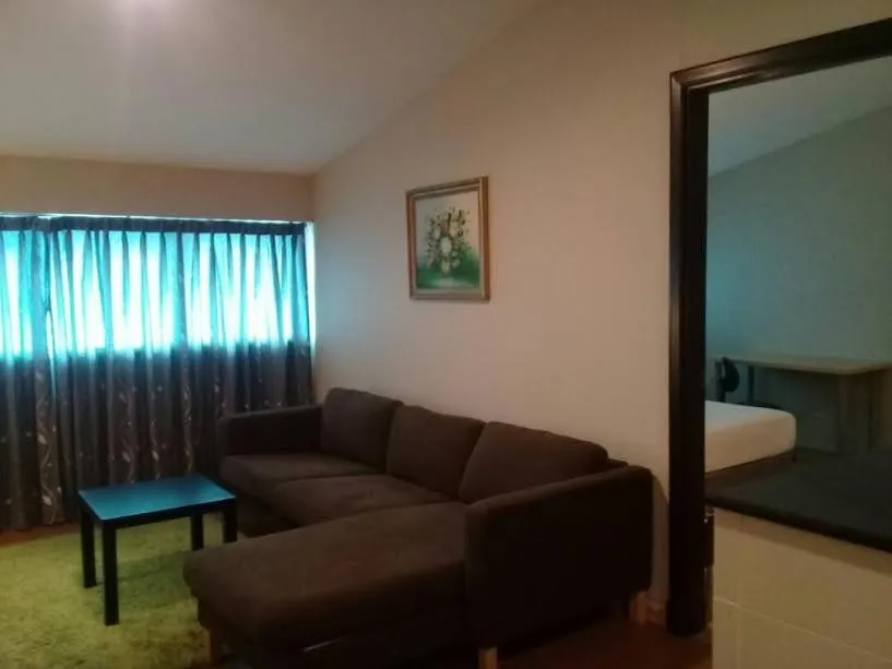 Bed in Ginasuite Hotel