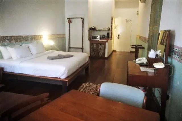 Bed in Ren I Tang Heritage Inn