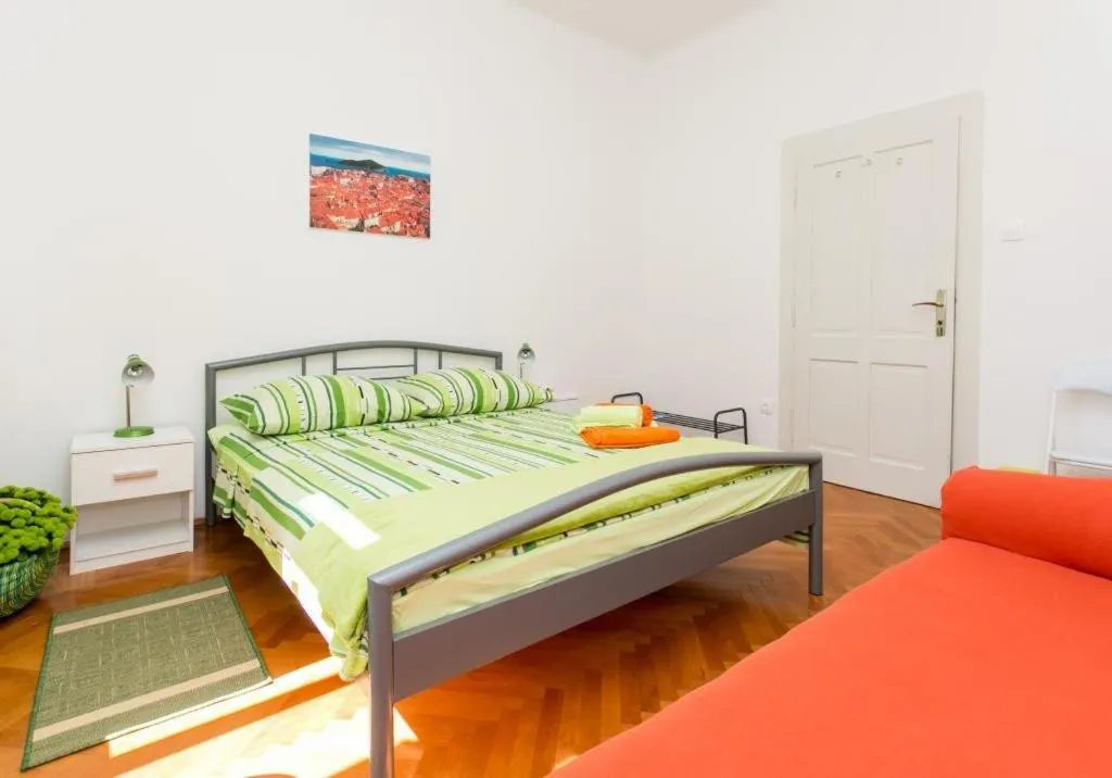 Bed in Apartment Blue & Green