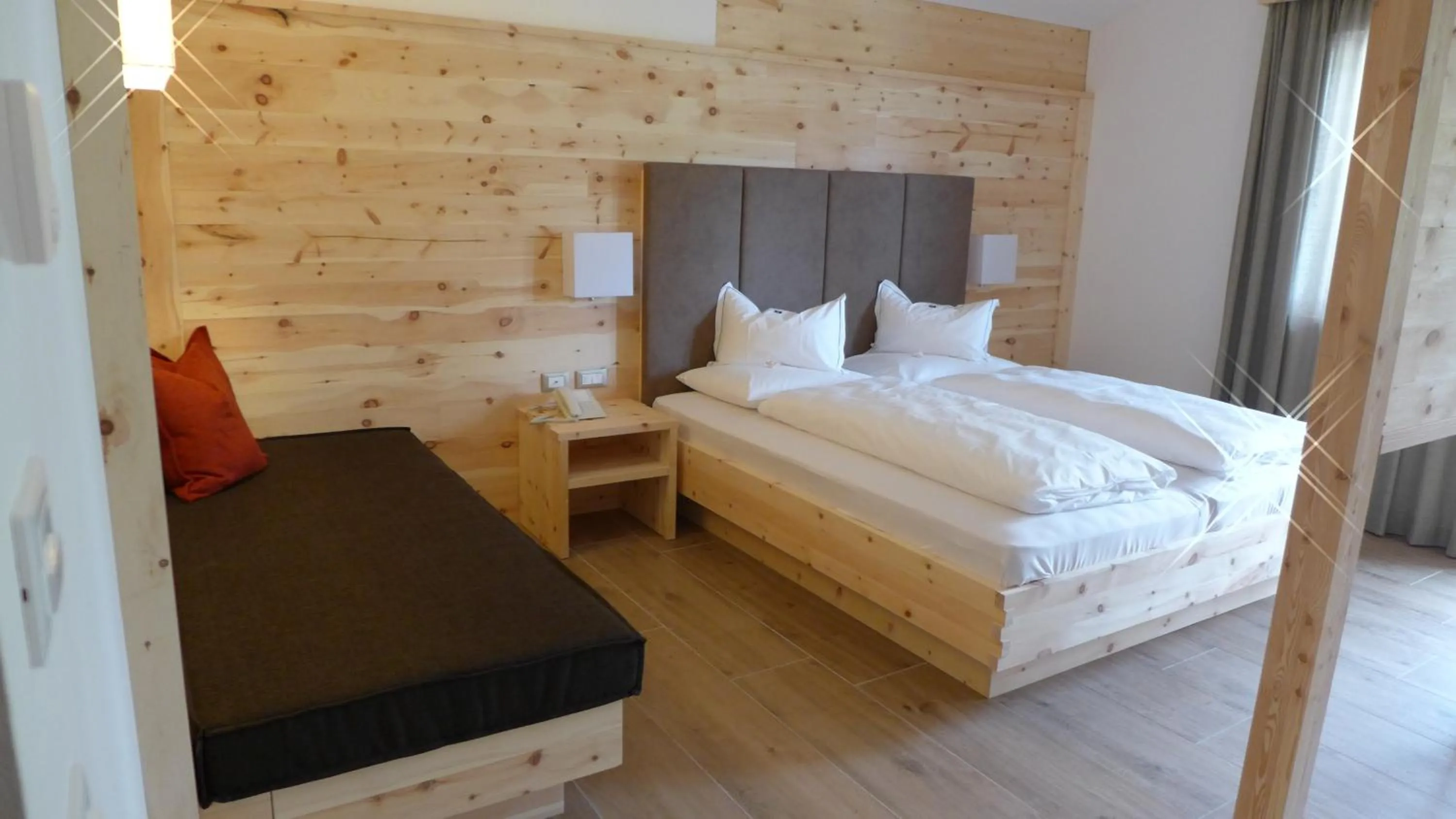 Photo of the whole room, Bed in Passo Sella Dolomiti Mountain Resort