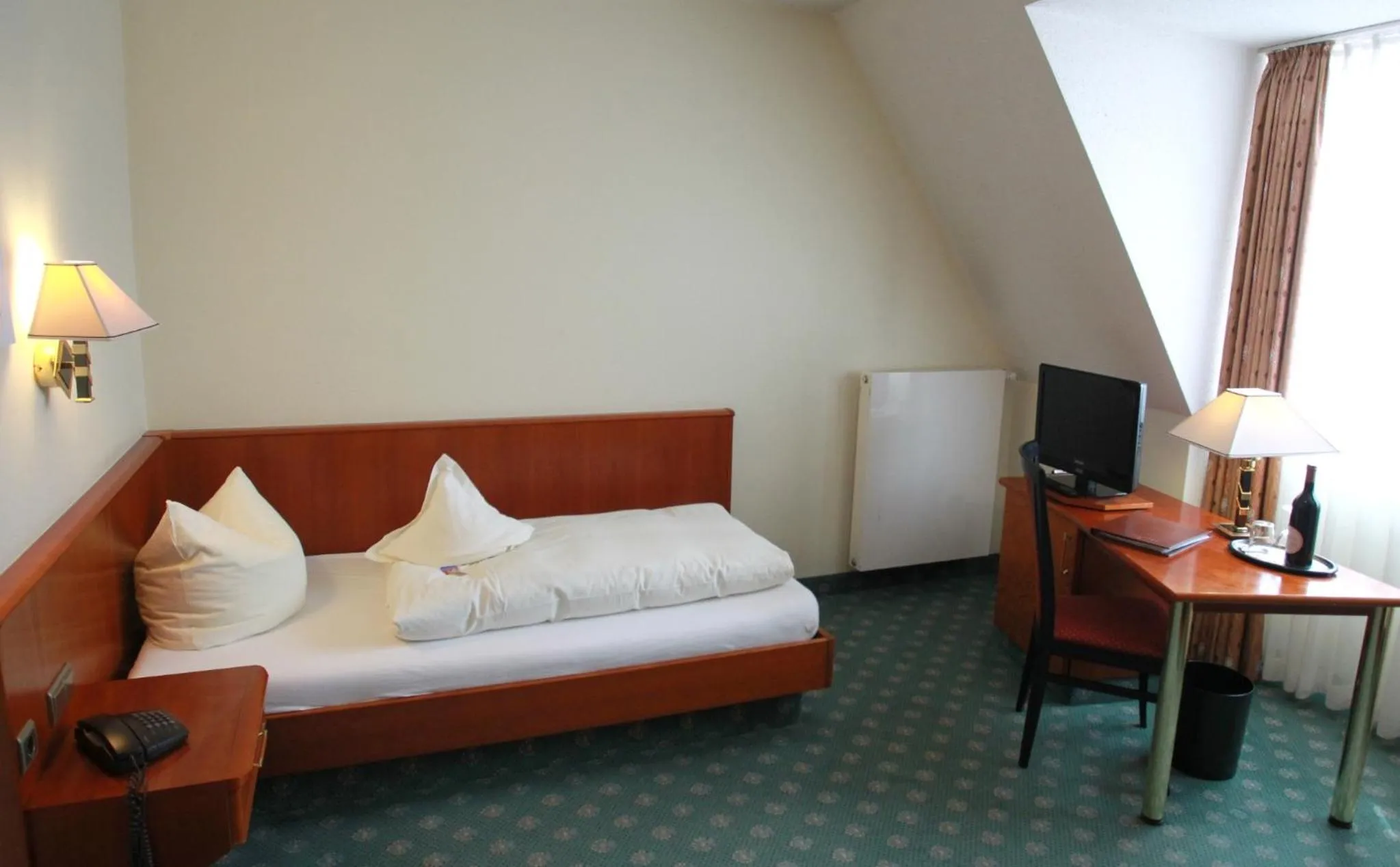 Photo of the whole room, Bed in Weinhotel Rose