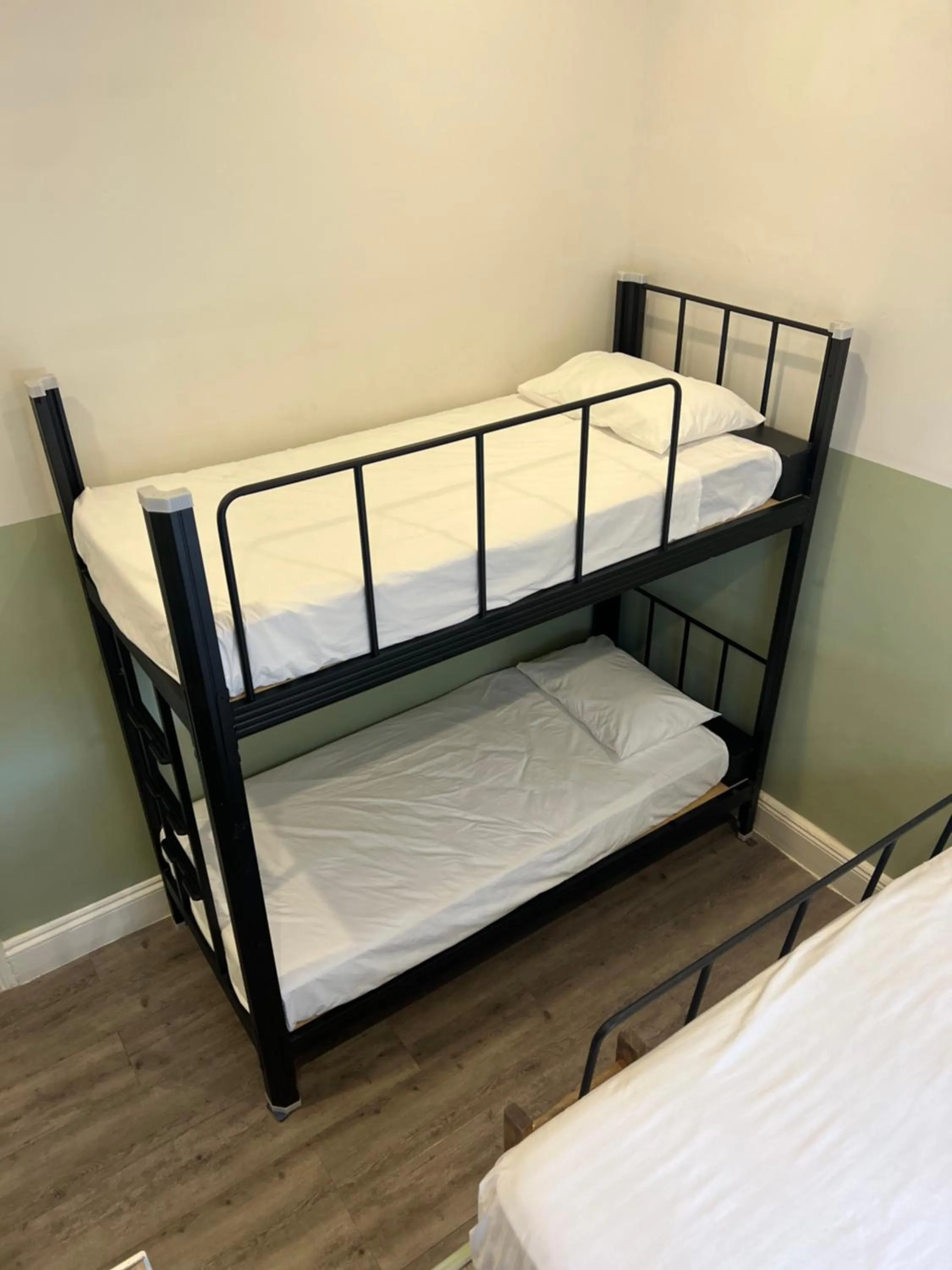 Bed in Native Rose Hotel