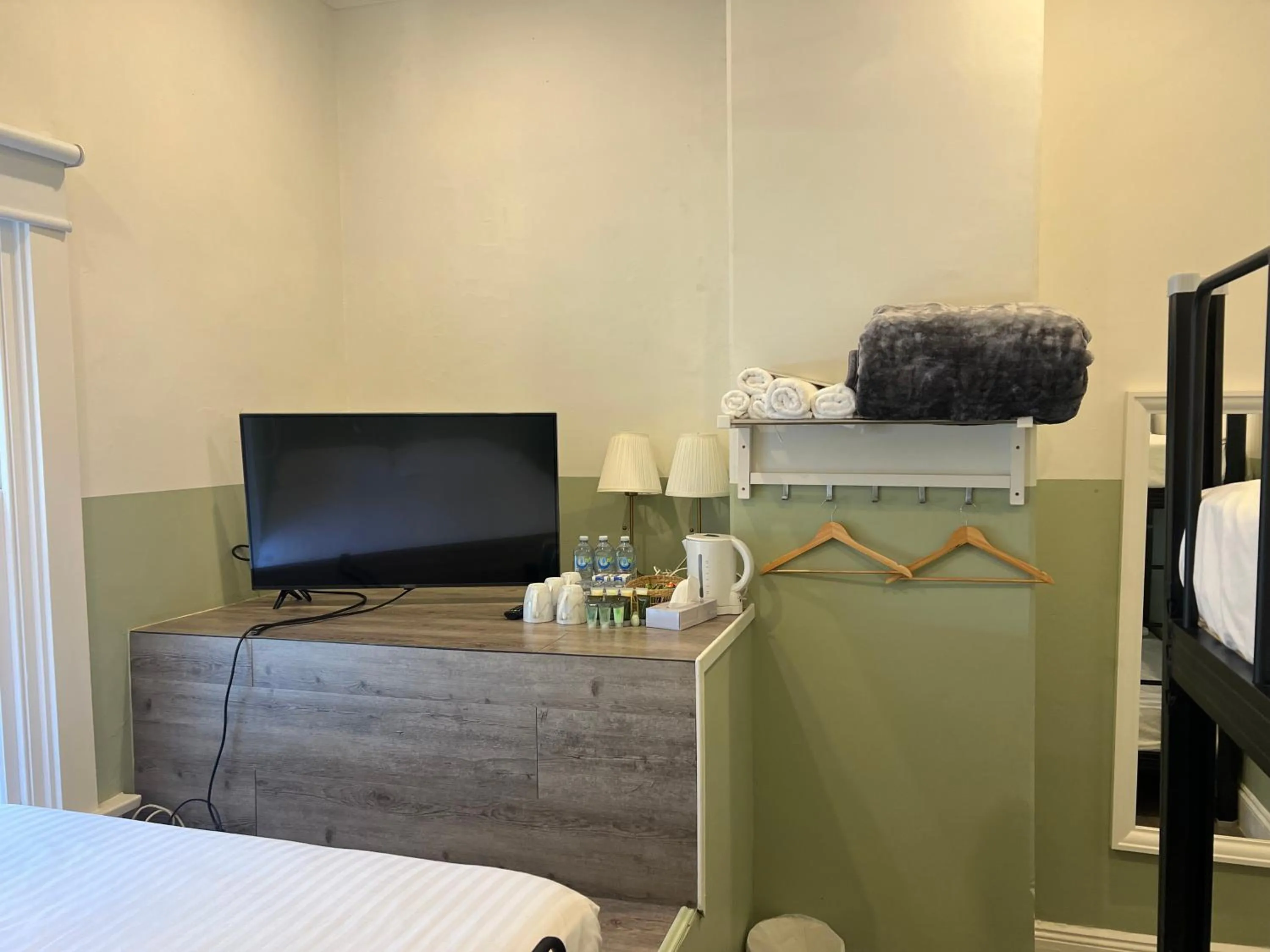 Bed in Native Rose Hotel