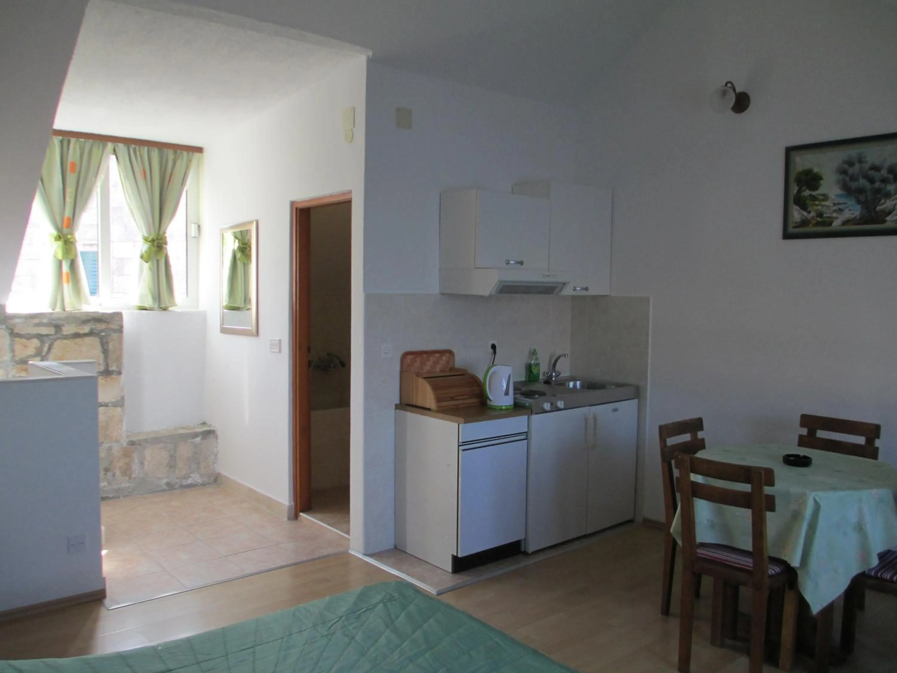 Kitchen or kitchenette in Apartments Acalinović