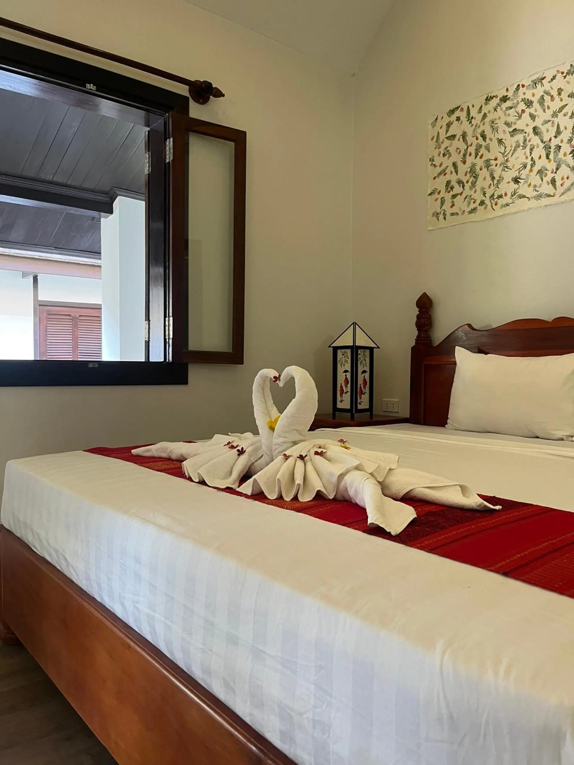 Bed in Villa Namkhan Heritage