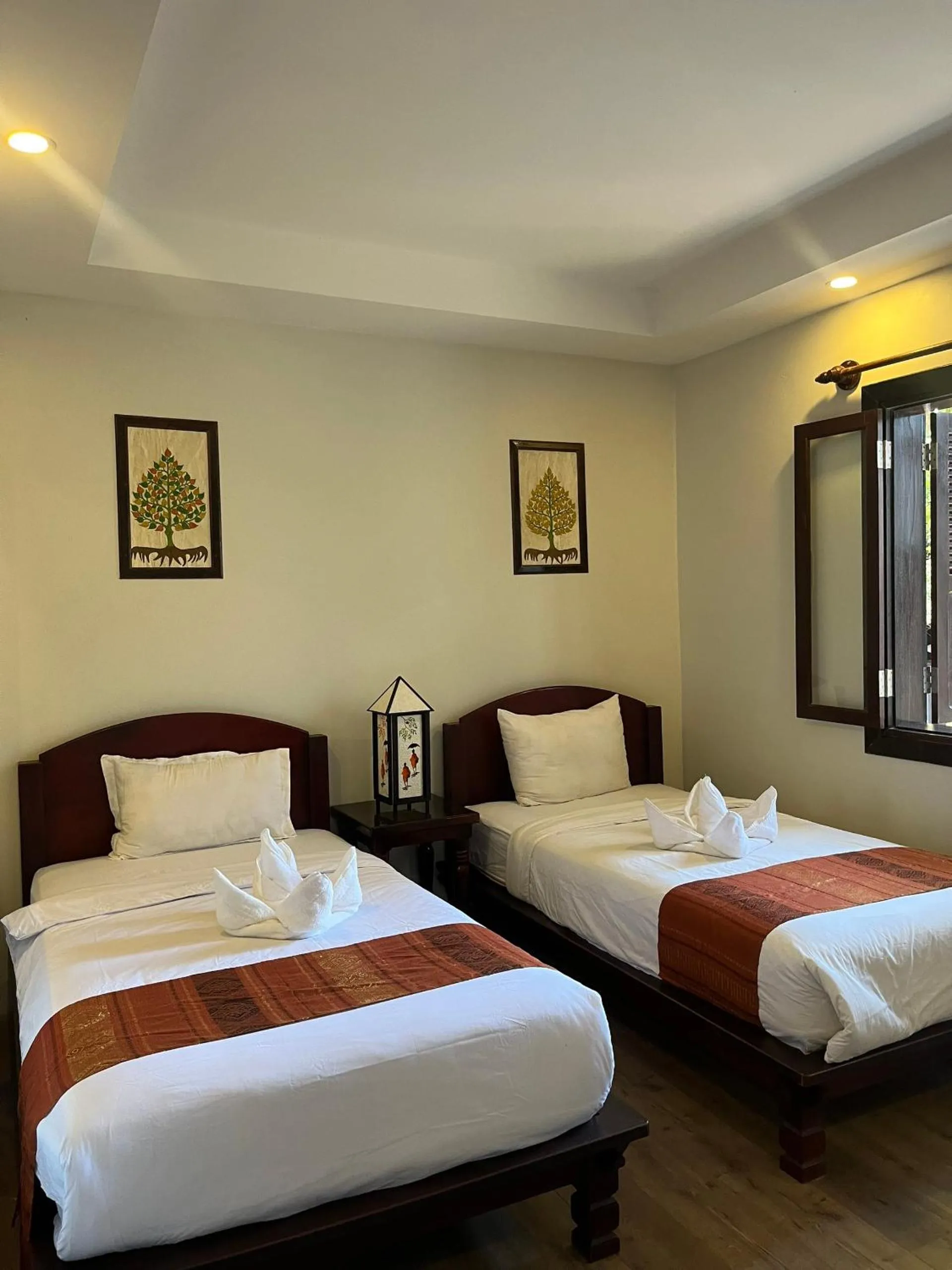 Bed in Villa Namkhan Heritage