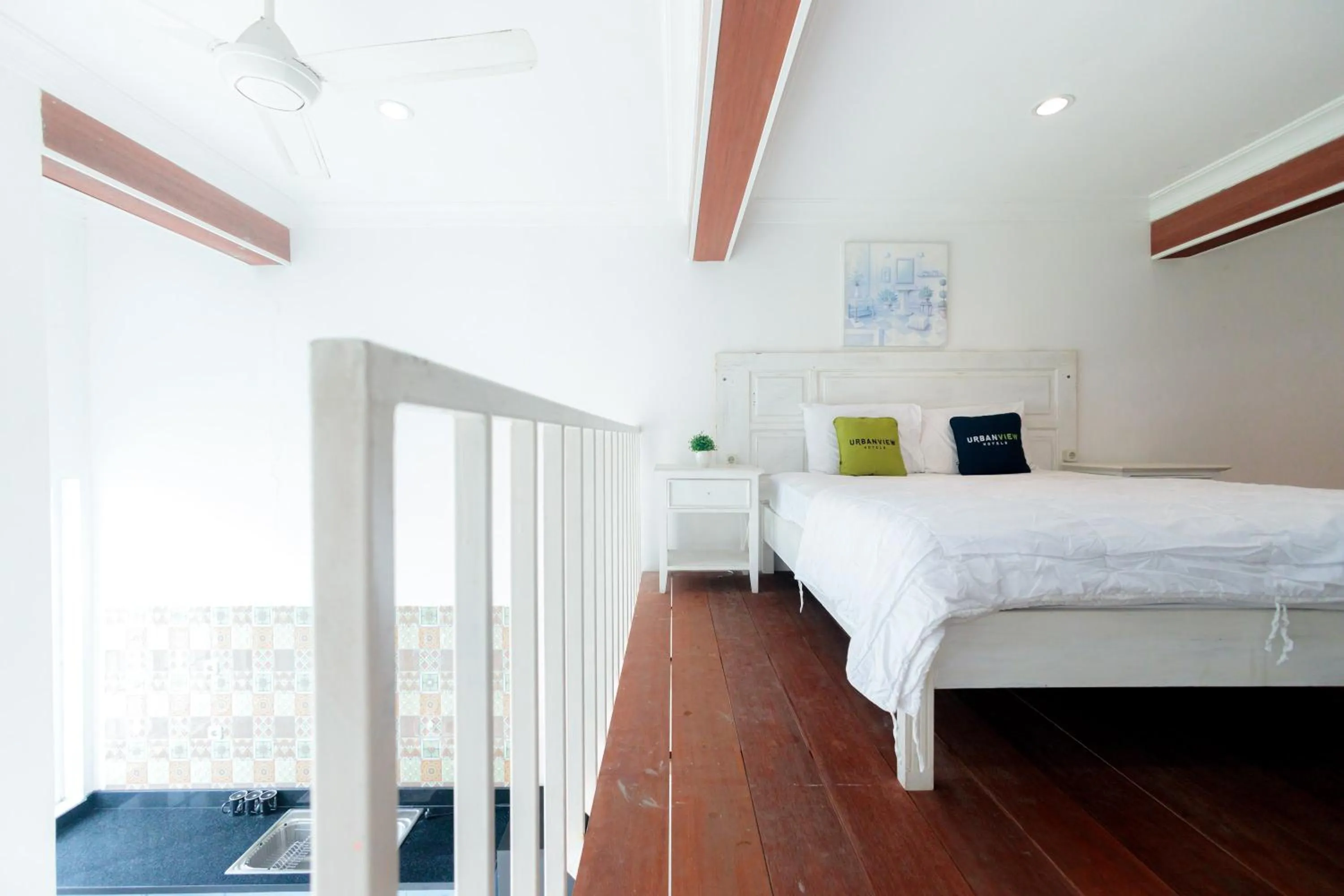 Bed in Urbanview Blessing Residence Surabaya by RedDoorz