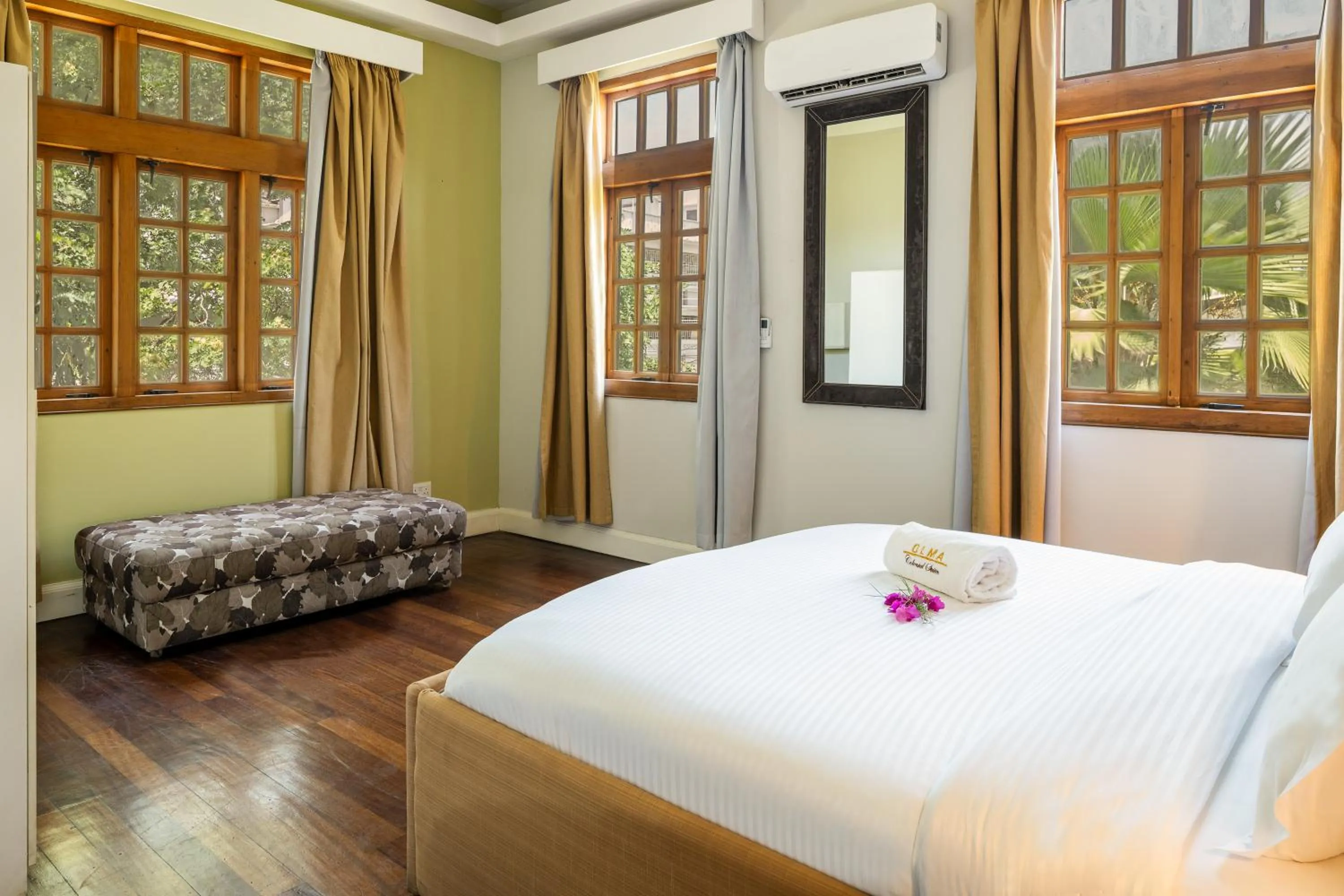 Bed in Olma Hotel & Suites