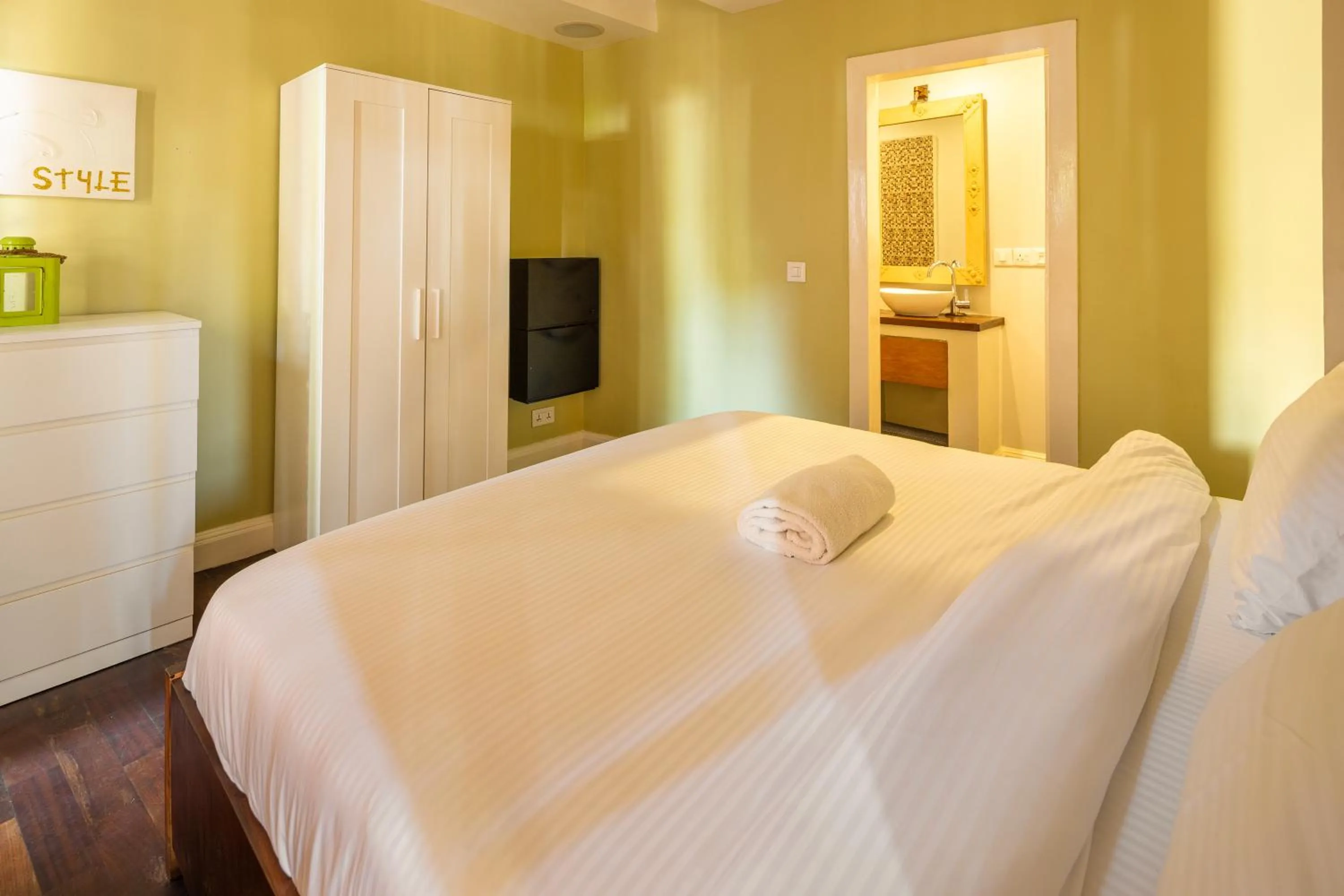 Bed in Olma Hotel & Suites