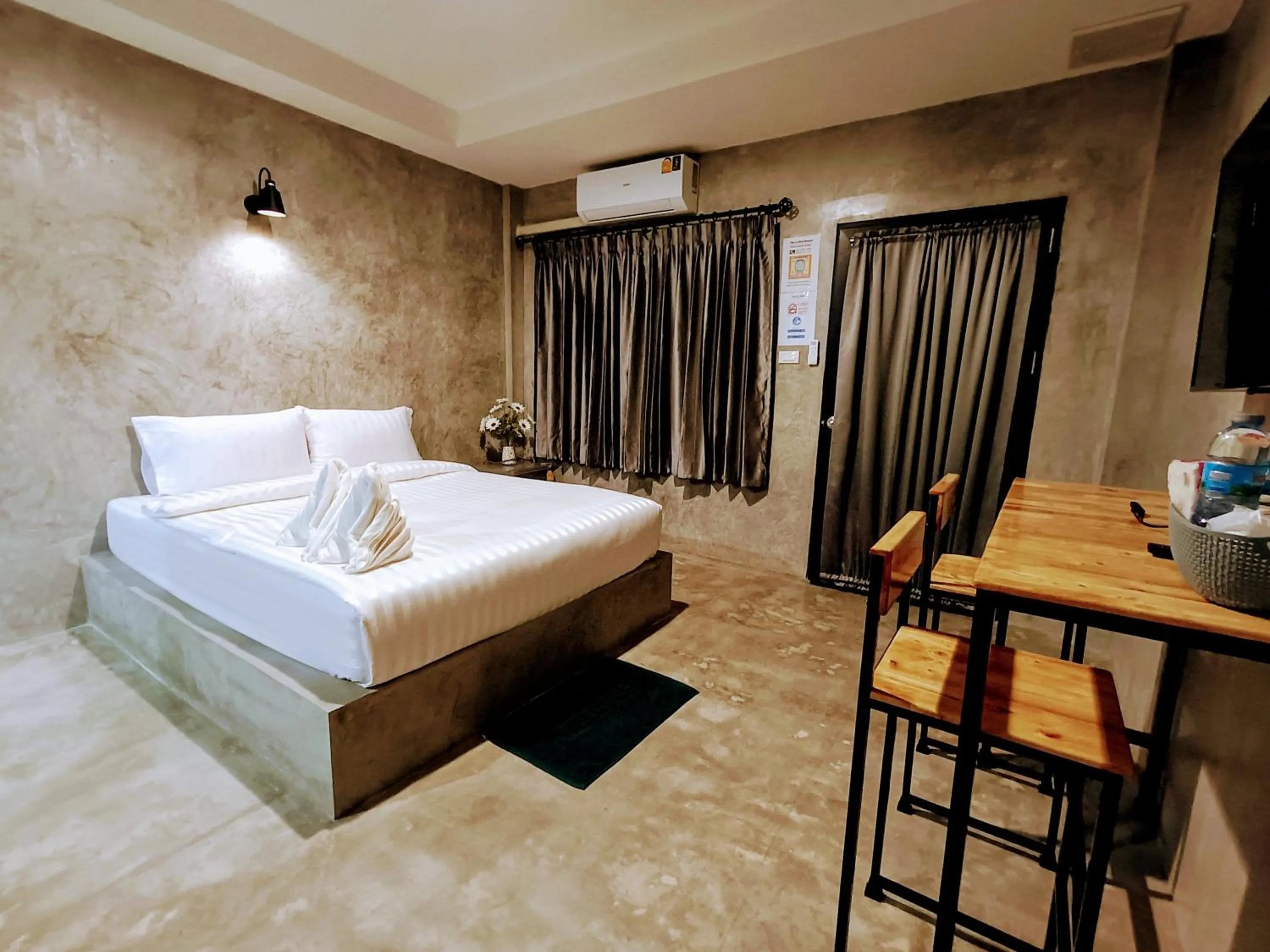 Bed in The Loftel Resort