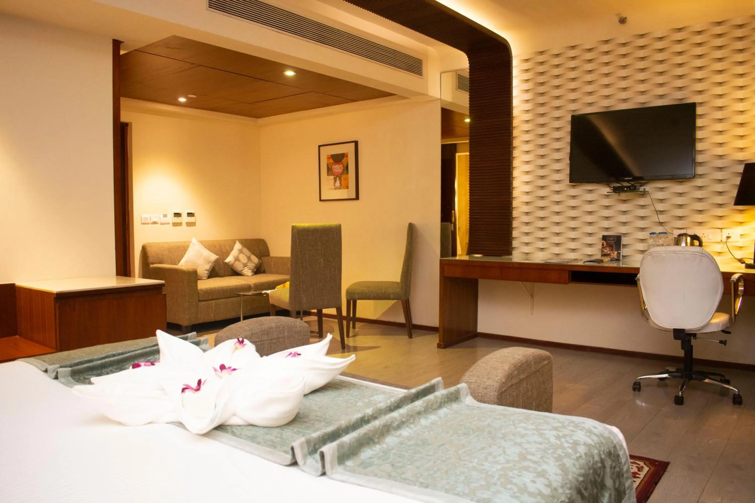 Bed in Regenta Orkos Kolkata by Royal Orchid Hotels Limited