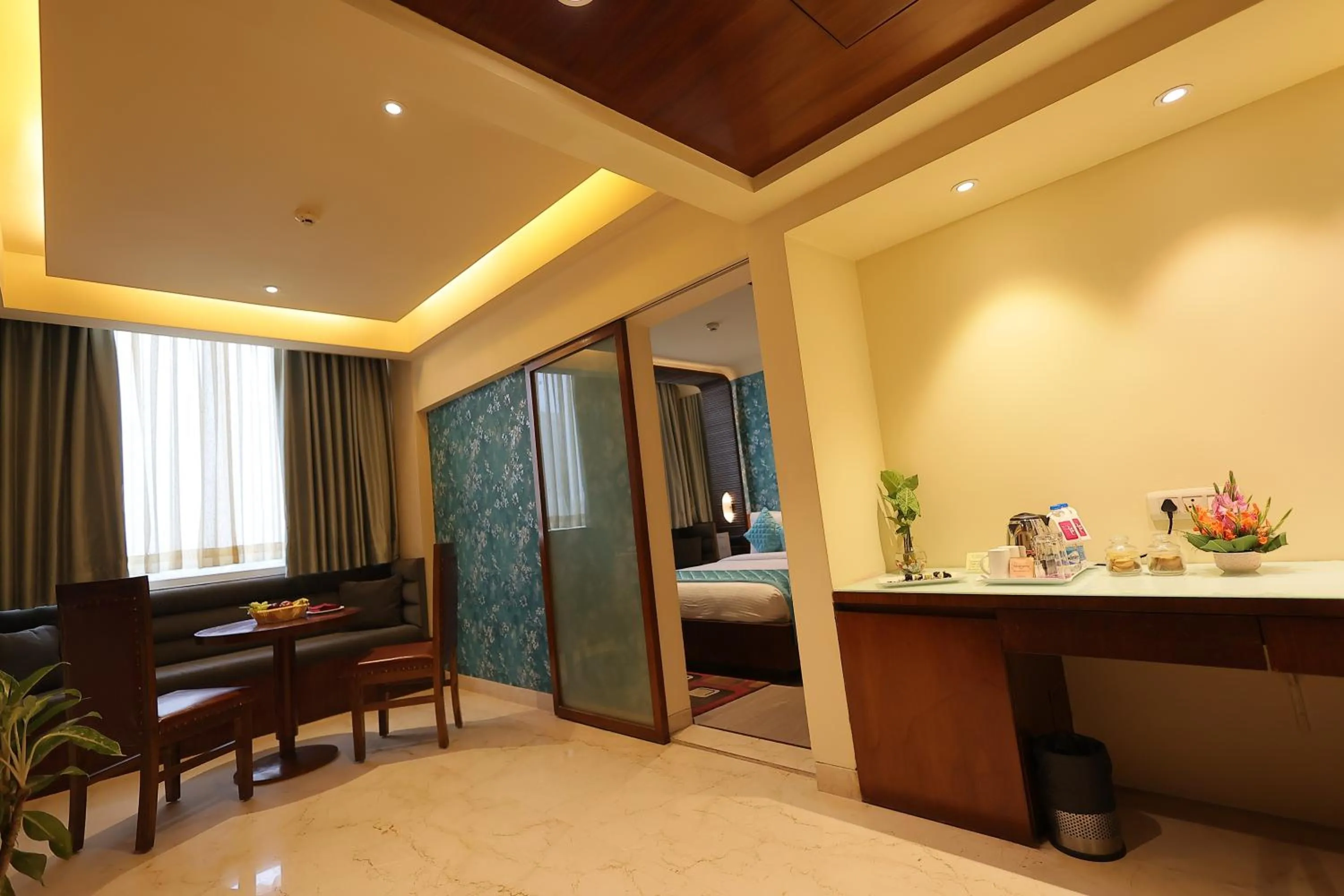 Living room in Regenta Orkos Kolkata by Royal Orchid Hotels Limited