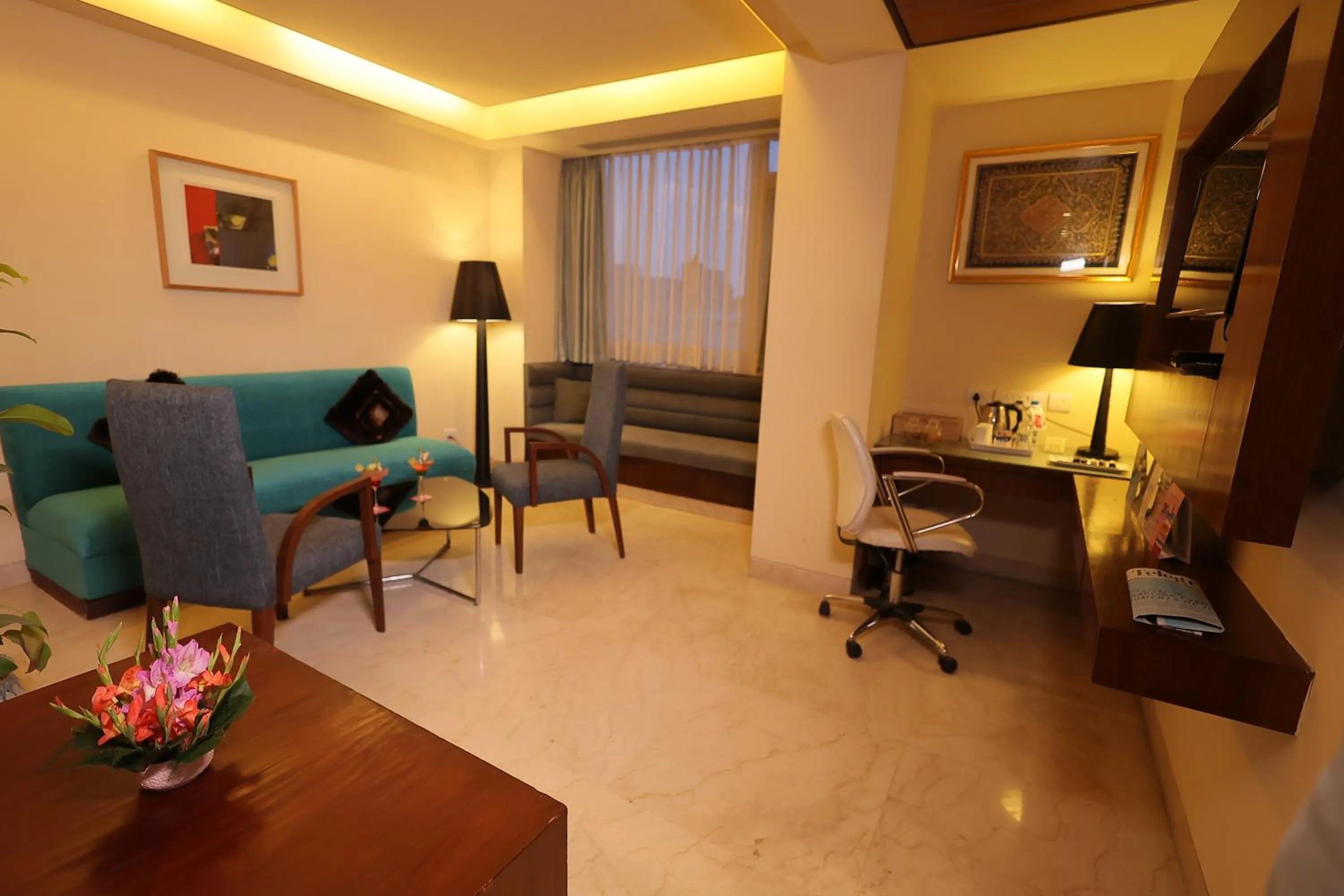 Living room in Regenta Orkos Kolkata by Royal Orchid Hotels Limited