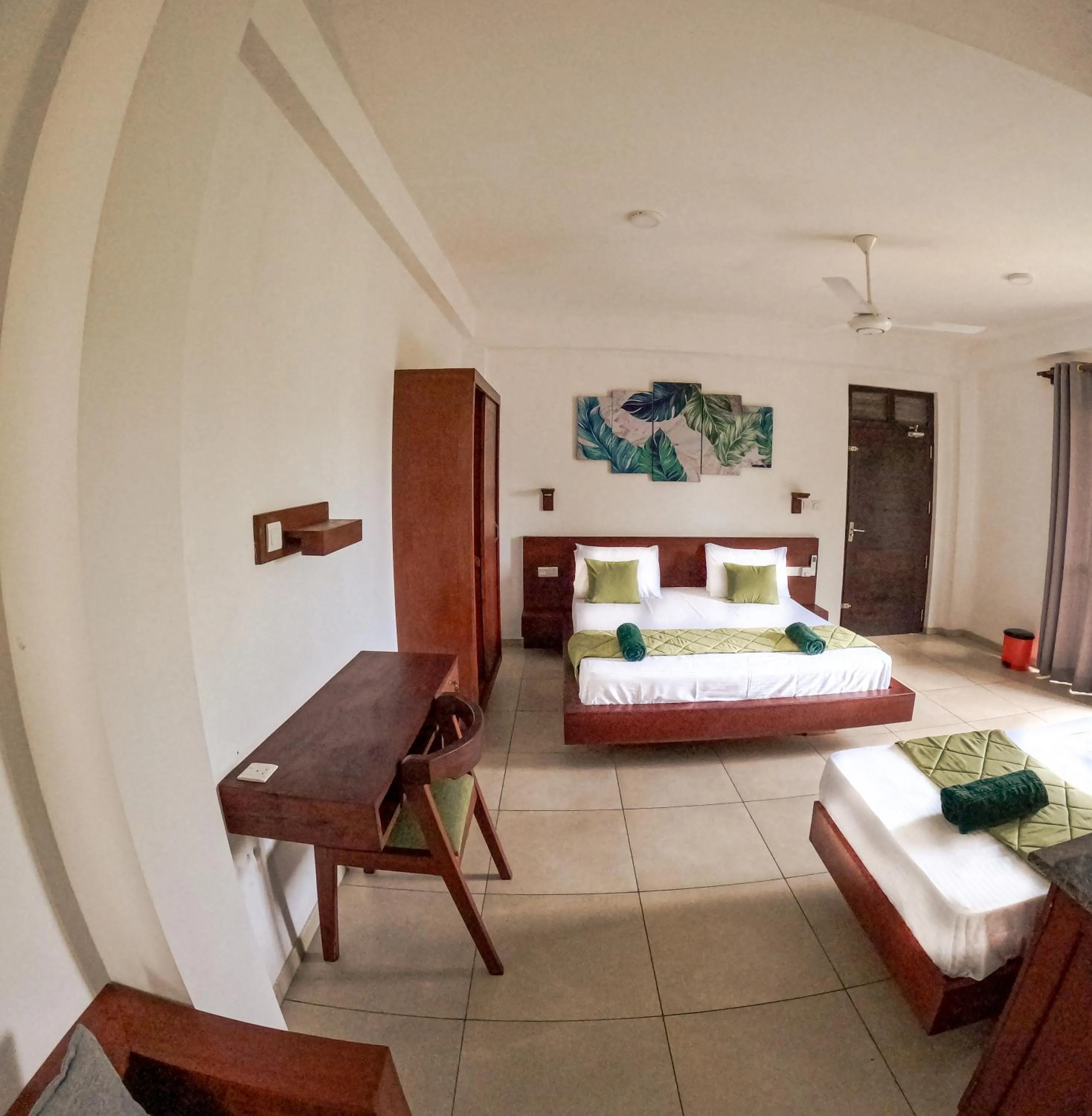 Bedroom, Bed in Traveller's Hotel Hikkaduwa