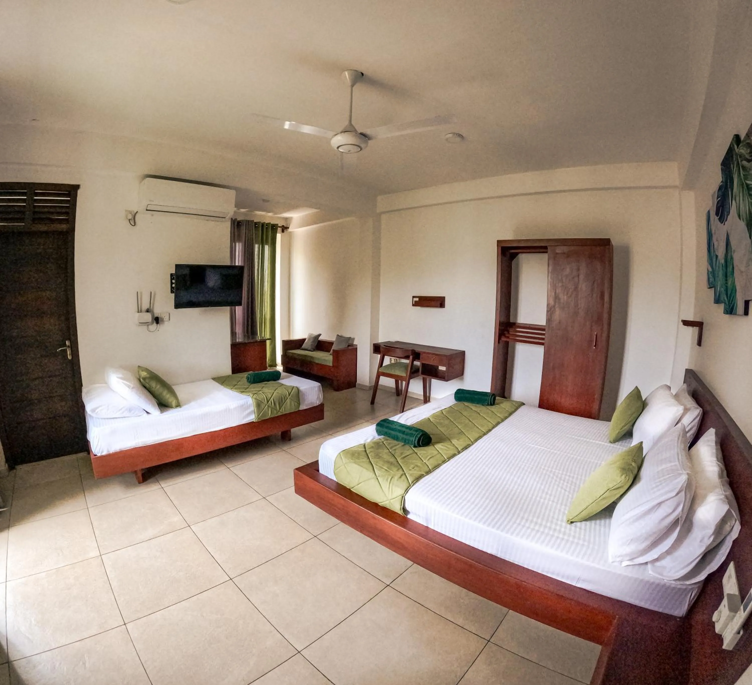 Bedroom, Bed in Traveller's Hotel Hikkaduwa