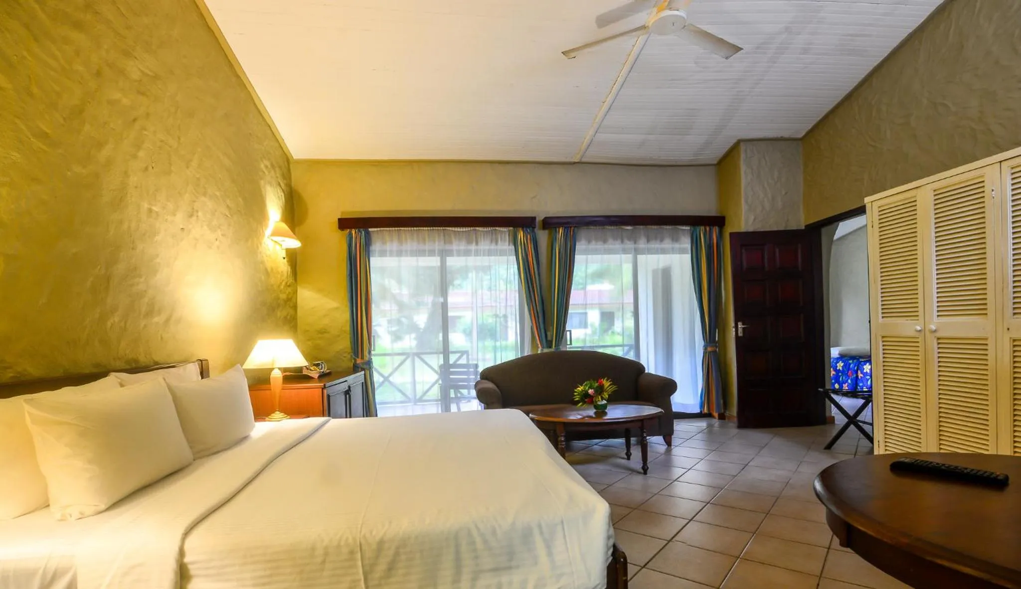 Photo of the whole room, Bed in Berjaya Praslin Resort