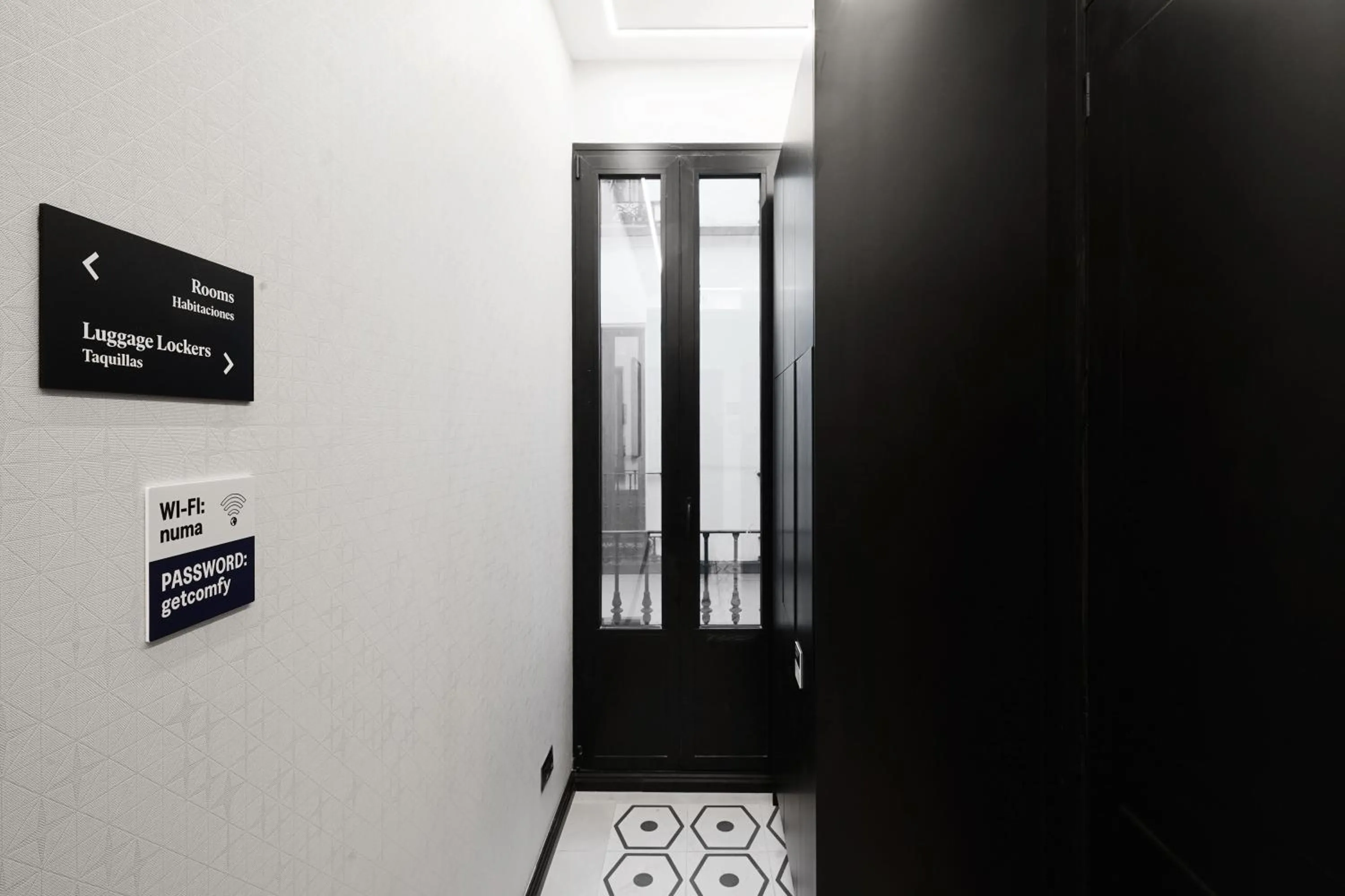 Logo/Certificate/Sign in Numa Madrid Luna