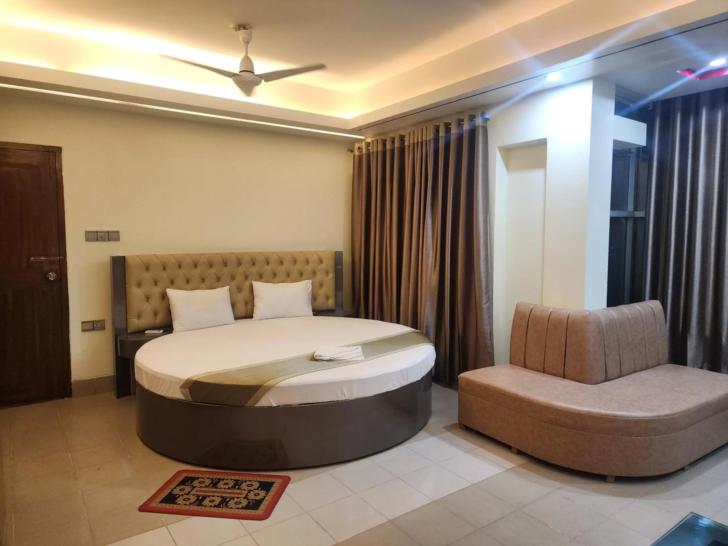 Bed in Urmee Guest House