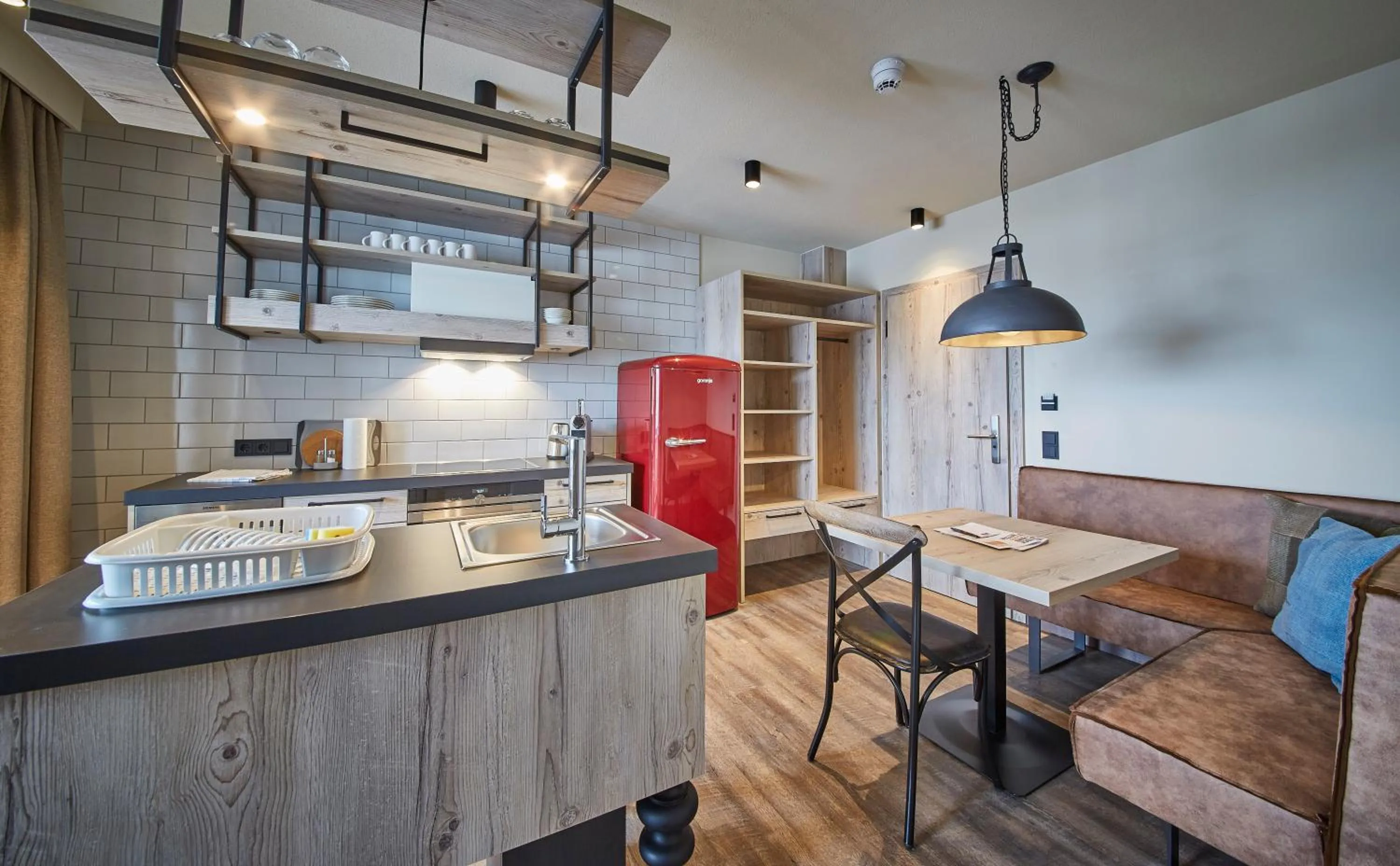 Kitchen or kitchenette in THOMSN Central Hotel & Appartements