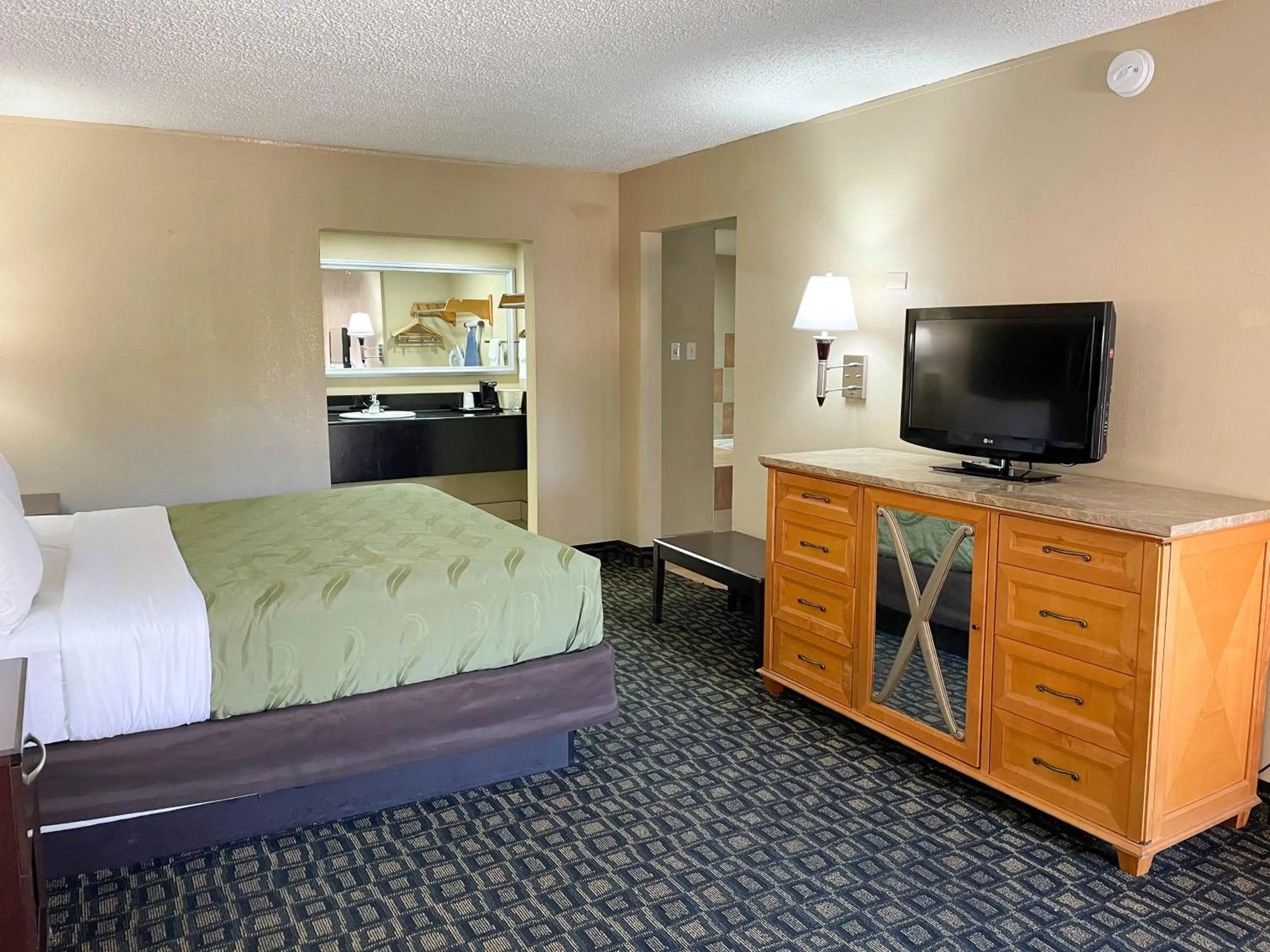 Bed in Studio 6 Suites North Richland Hills TX