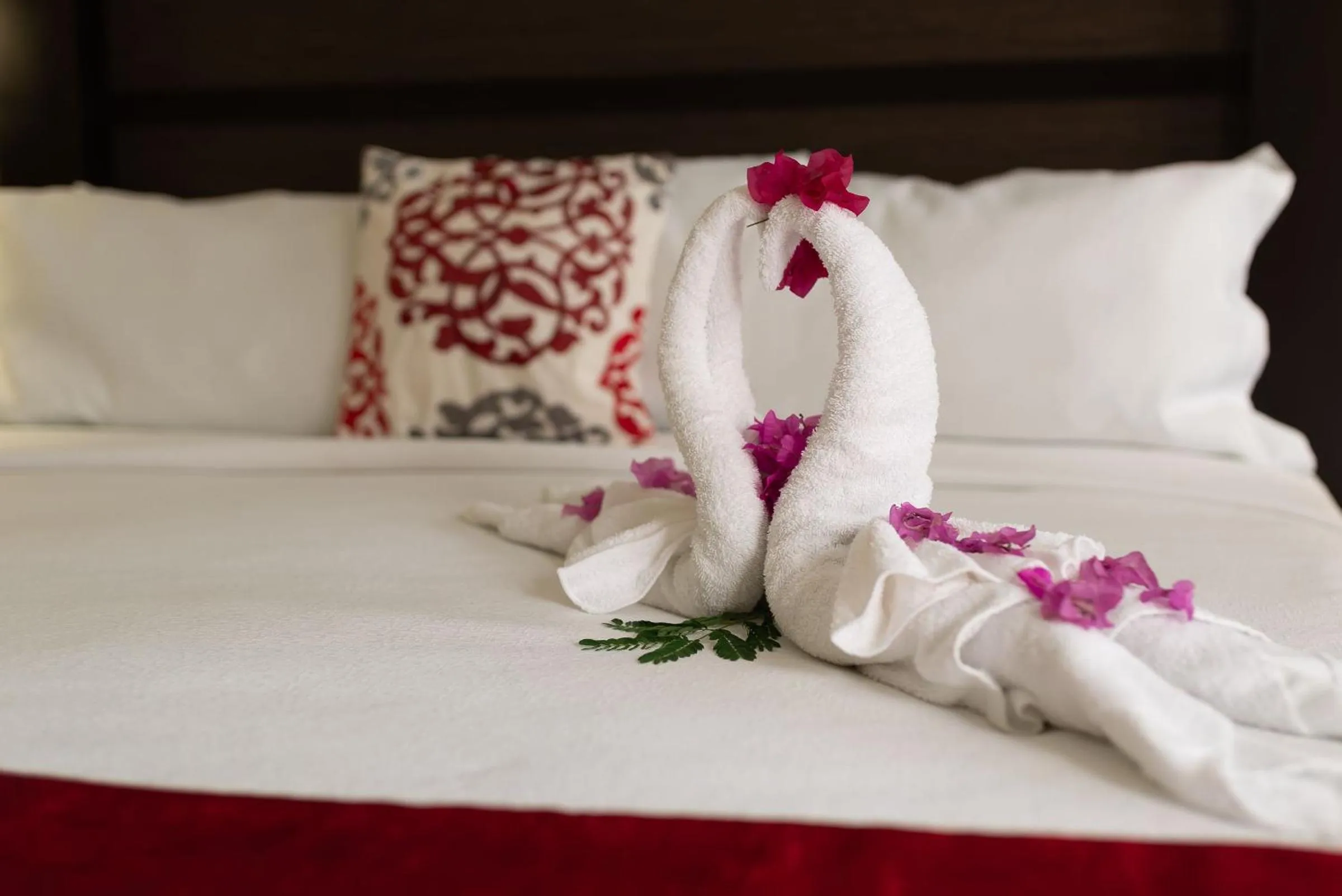 Bed in Baker's Suites