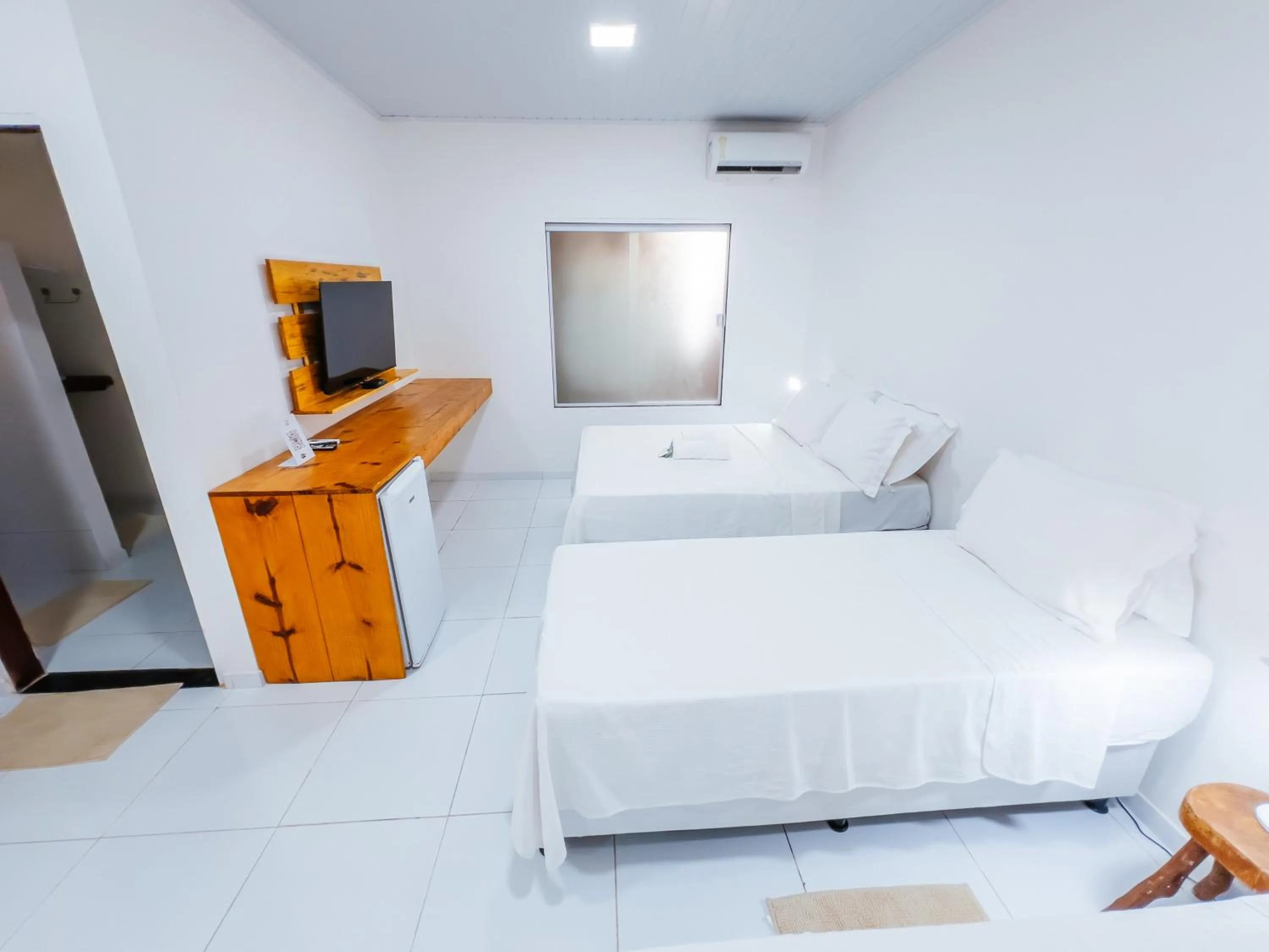 Bed in Pousada do Enildo