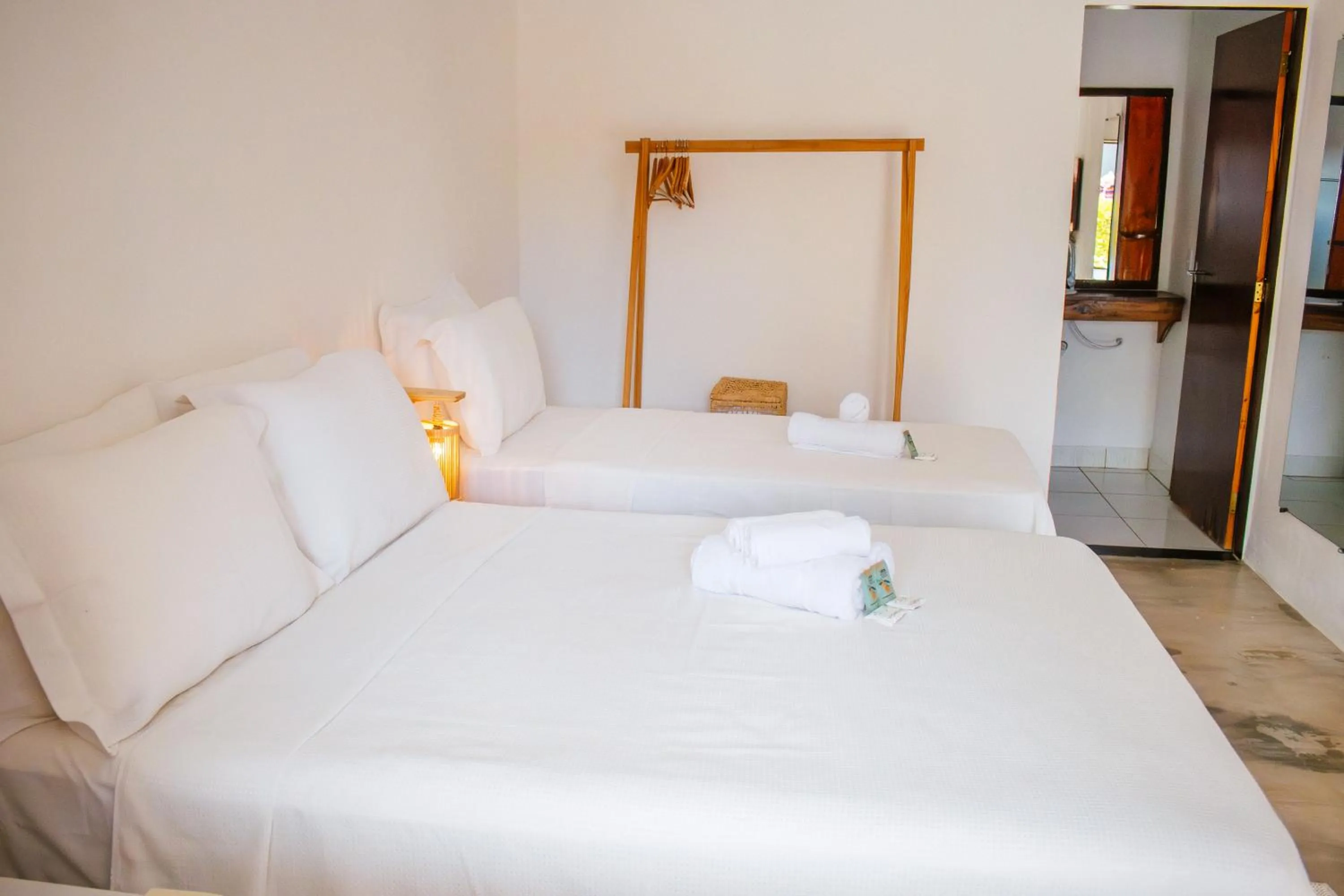 Bed in Pousada do Enildo