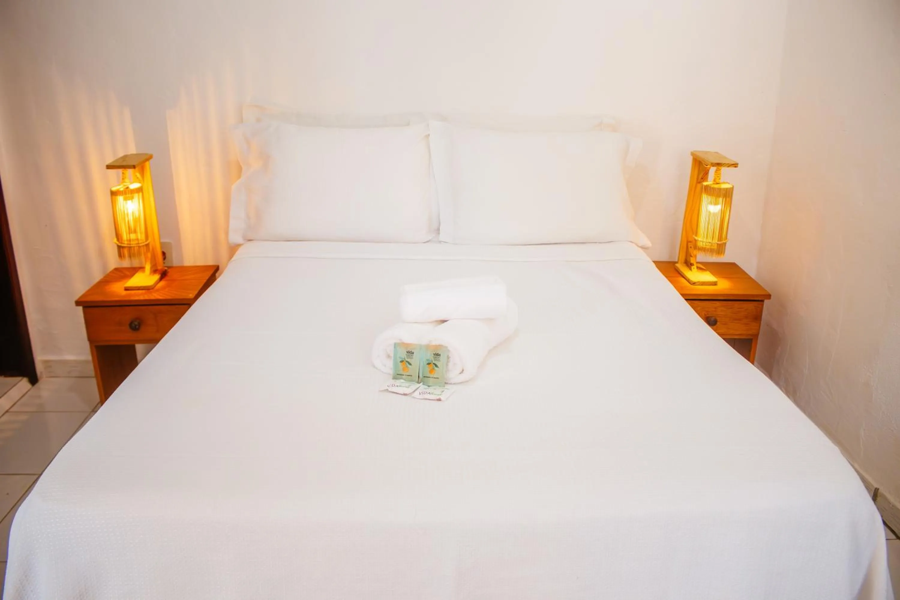 Bed in Pousada do Enildo