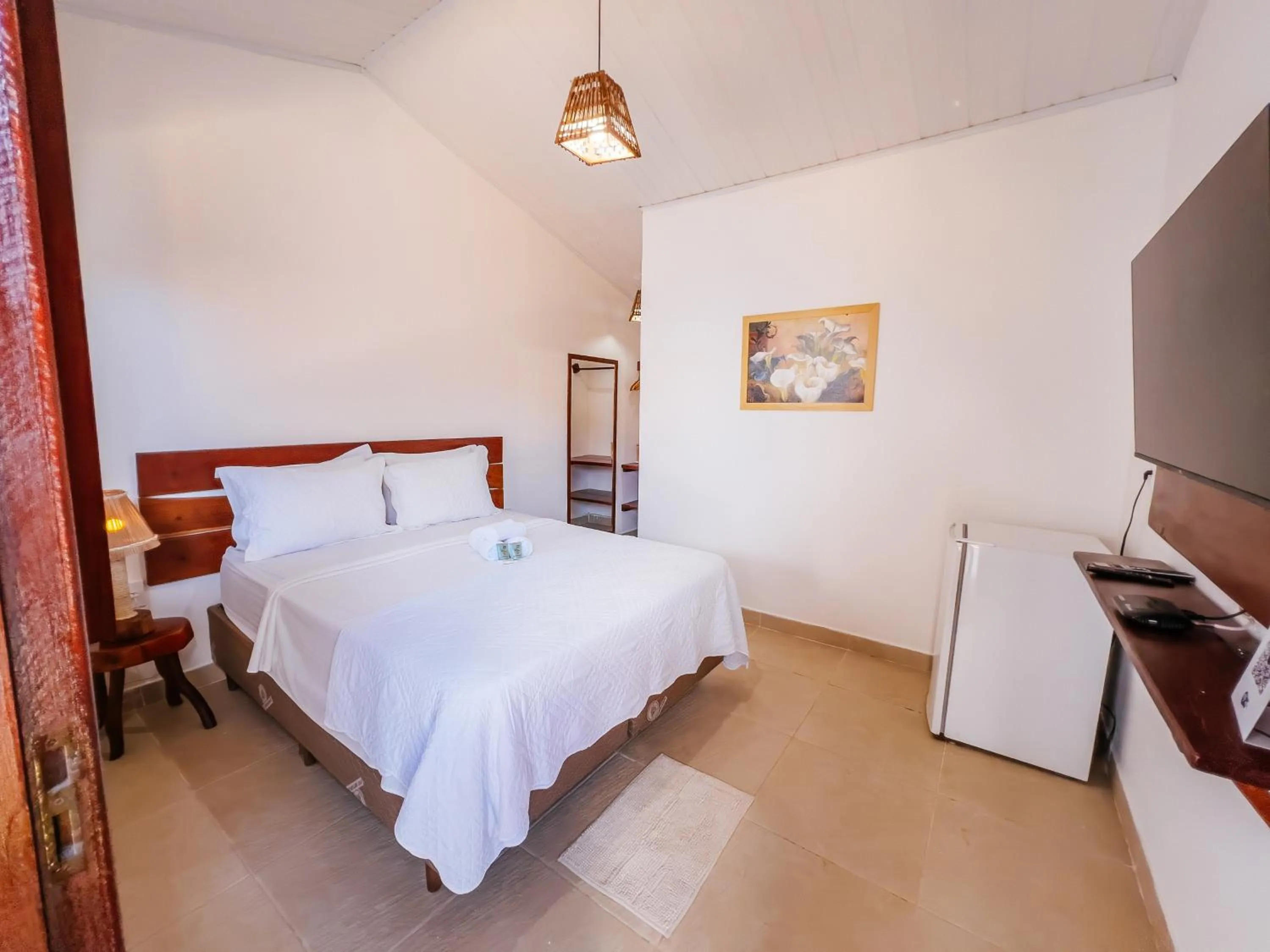 Bed in Pousada do Enildo