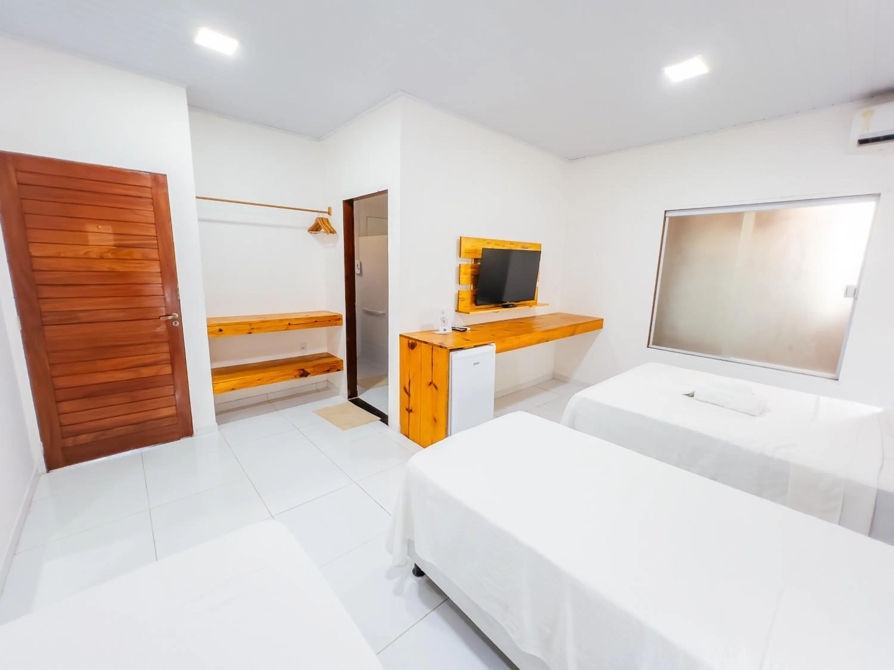 Bed in Pousada do Enildo