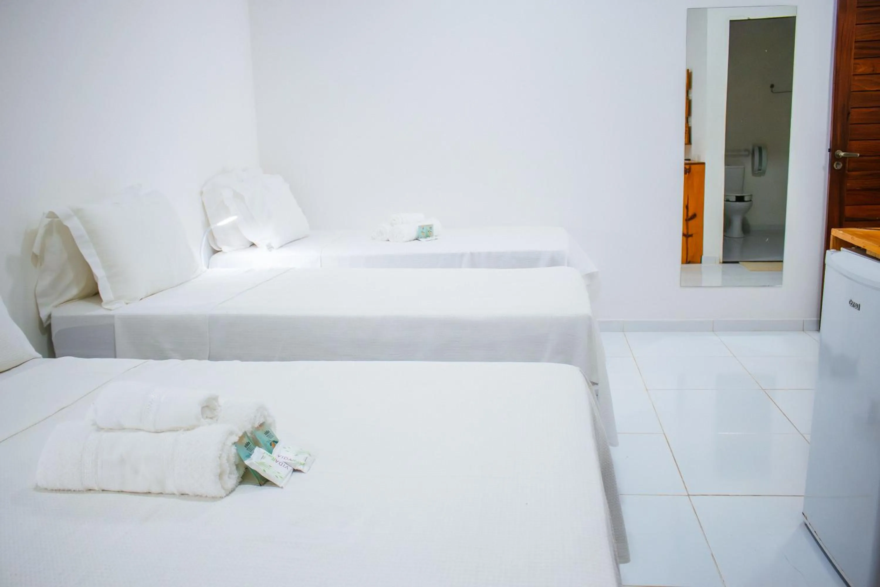 Bed in Pousada do Enildo