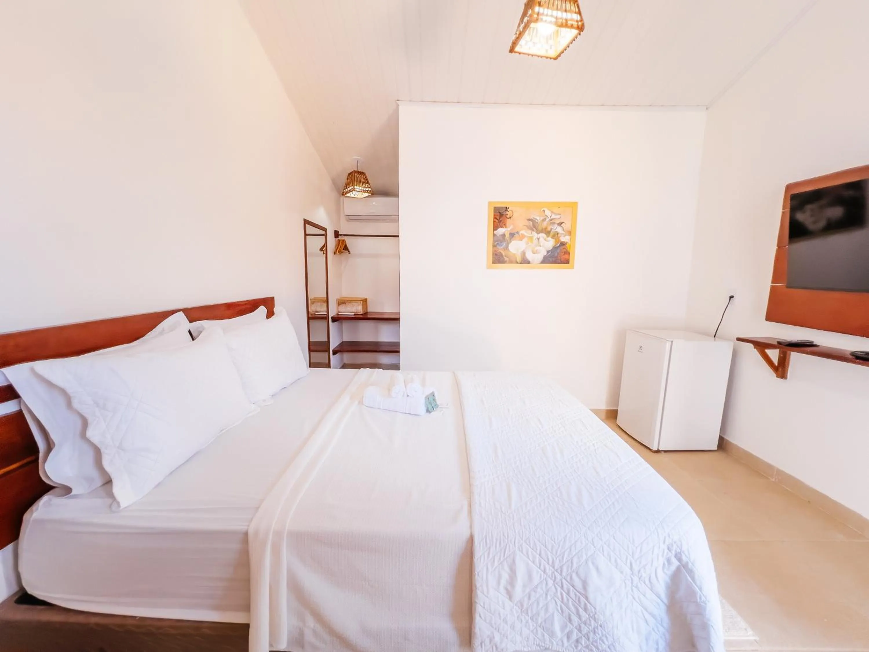 Bed in Pousada do Enildo