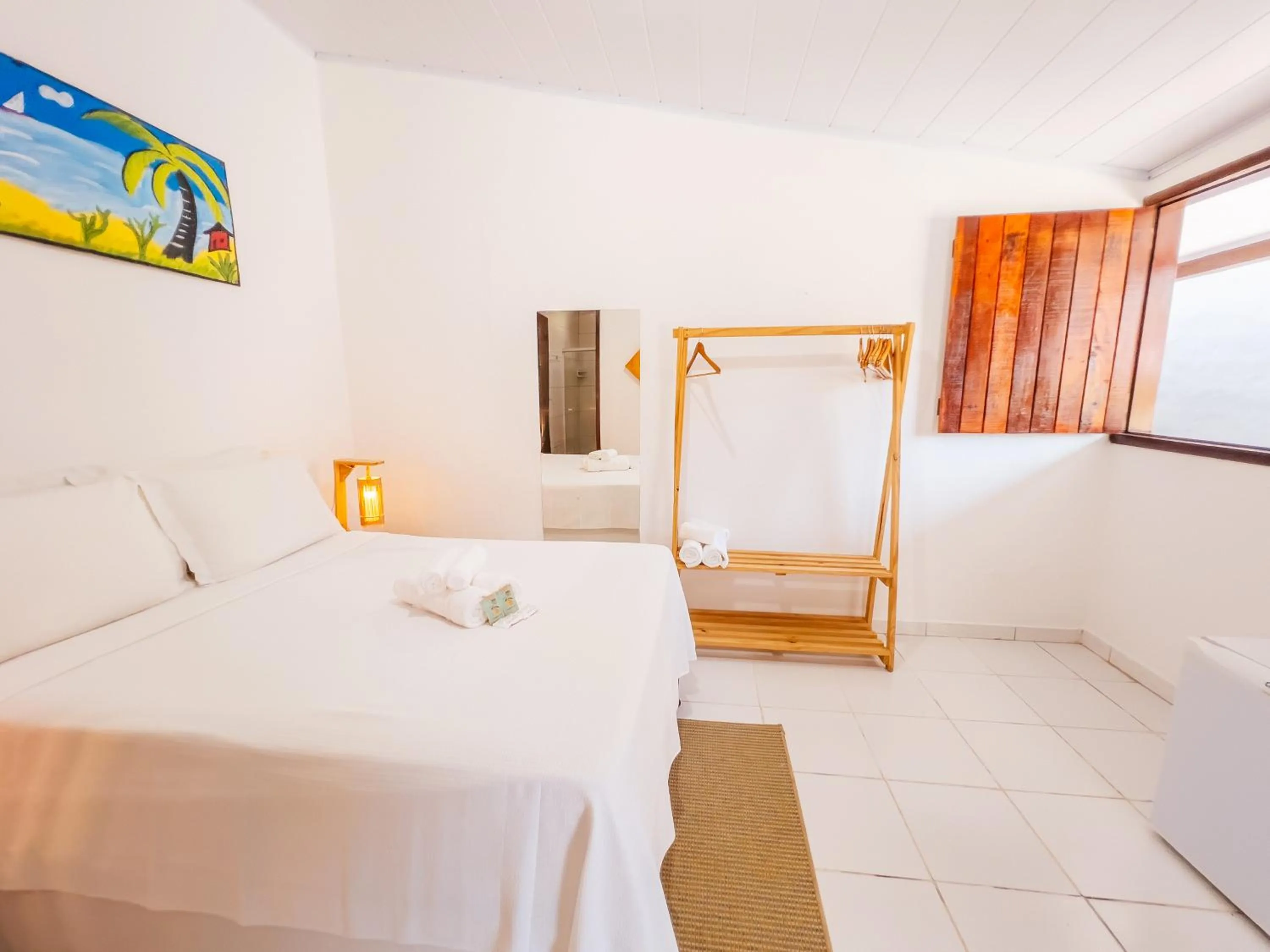 Bed in Pousada do Enildo