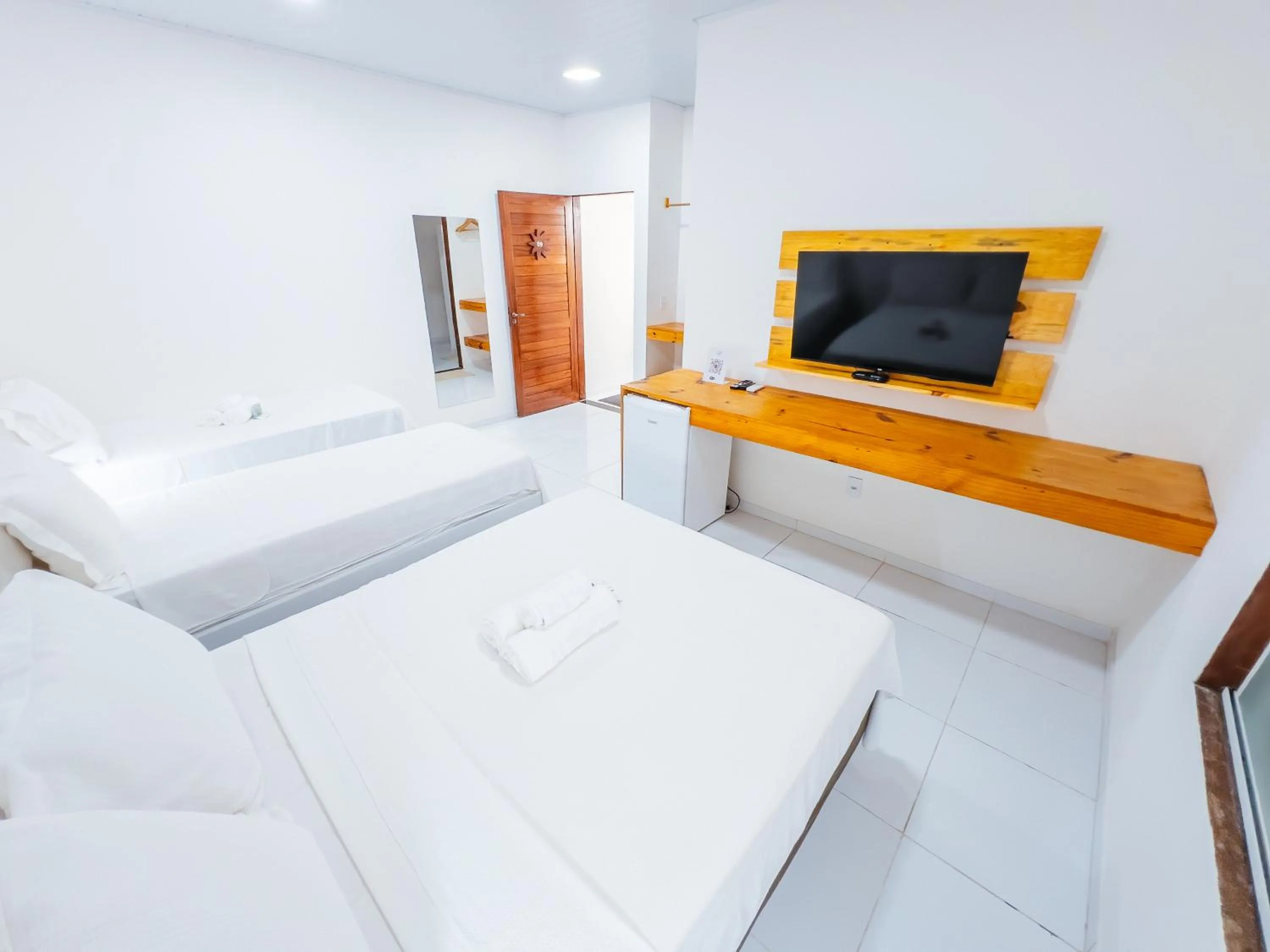 Bed in Pousada do Enildo