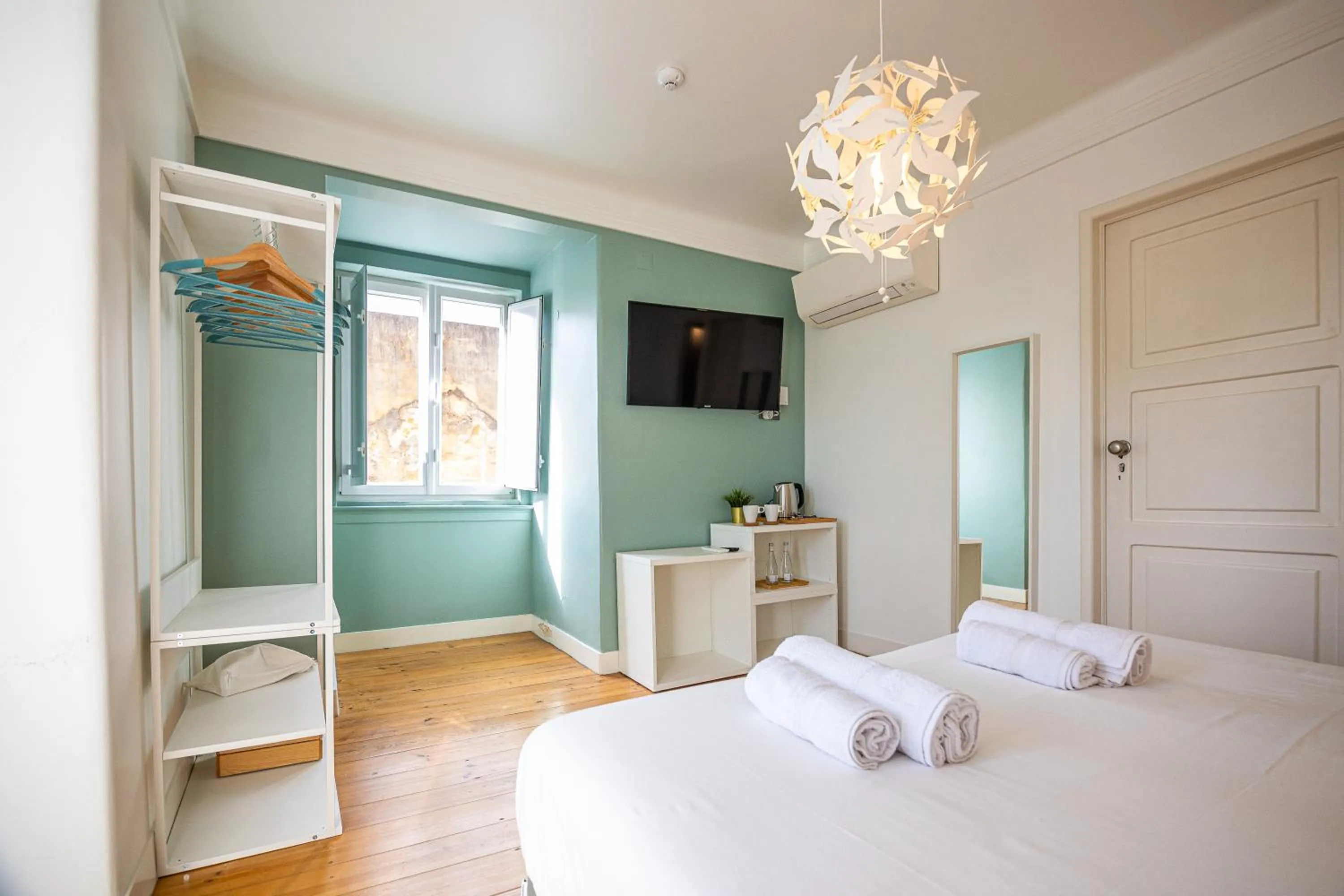 Bed in VAGO Alcântara Suites
