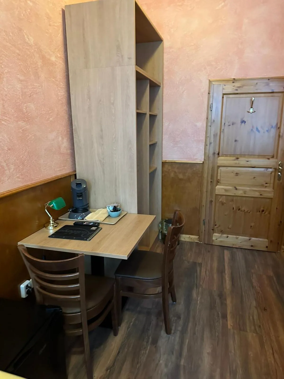 Seating area in Pensionszimmer Unicat