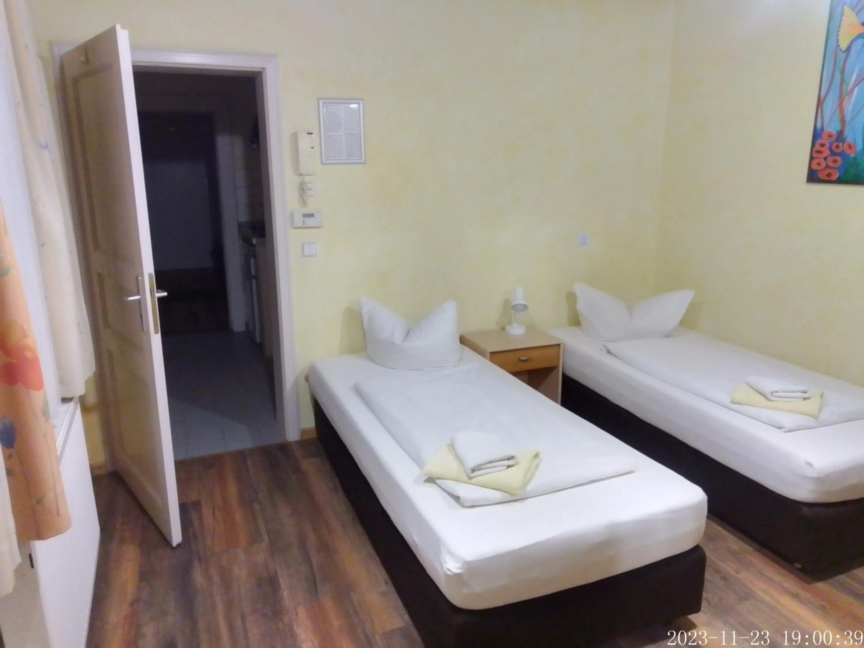 Bed in Pensionszimmer Unicat