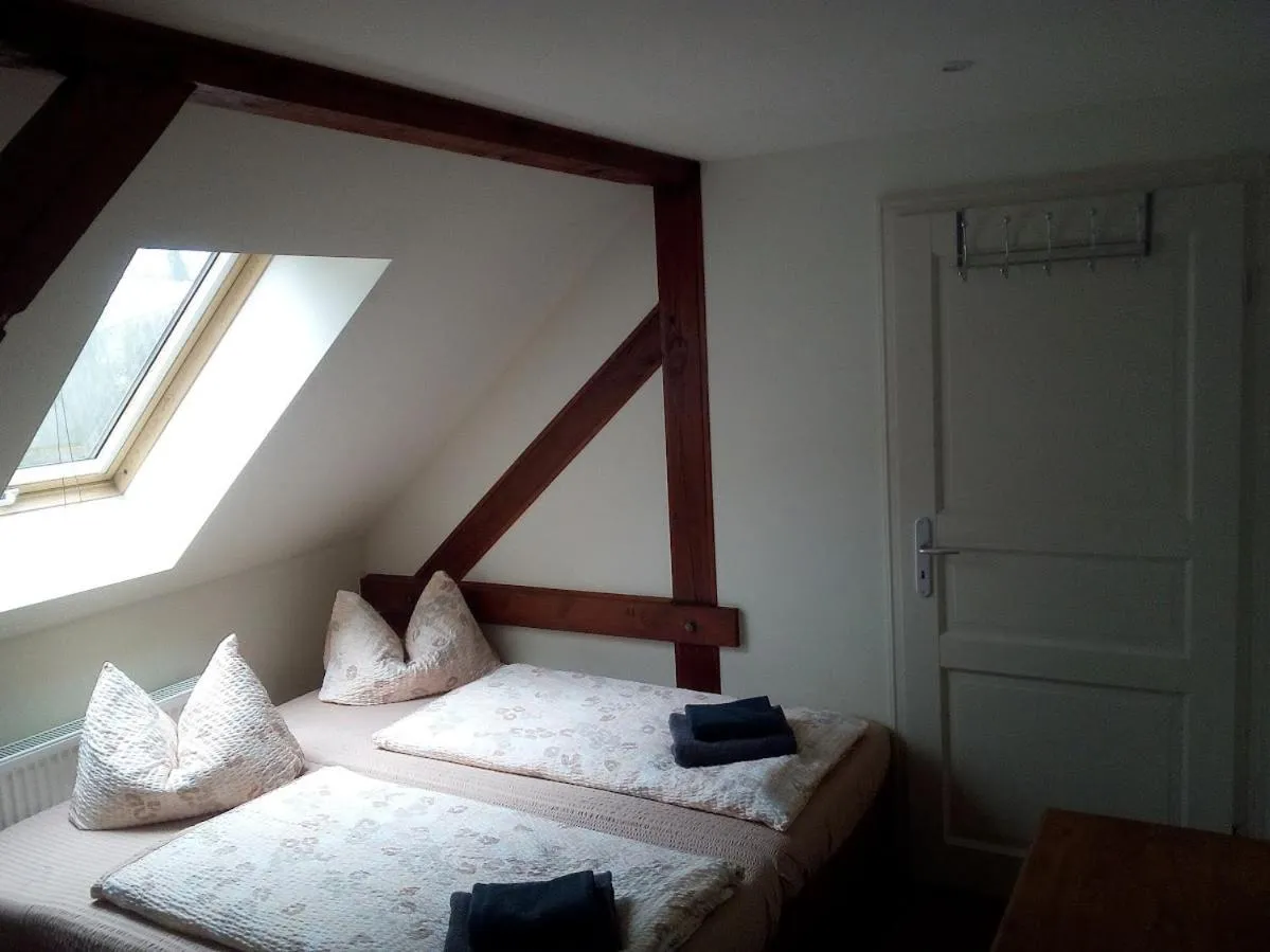 Photo of the whole room, Bed in Pensionszimmer Unicat